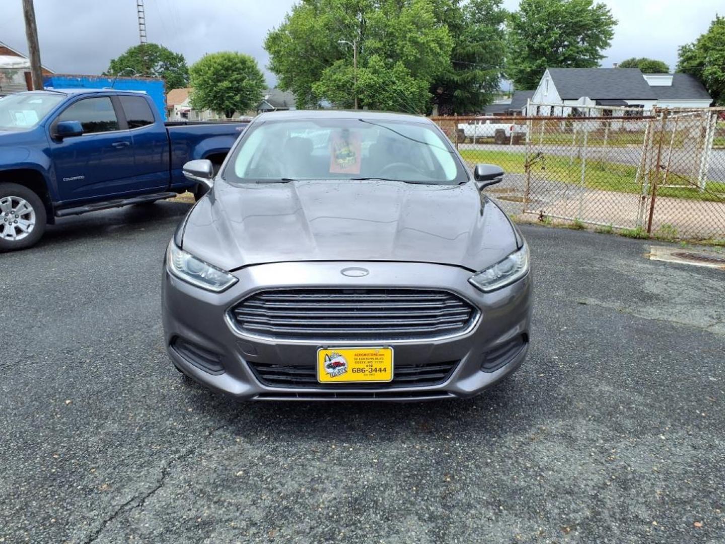 2014 Sterling Gray Metallic Ford Fusion SE (1FA6P0H79E5) with an 2.5L 4 Cylinder Sequential-Port F.I. engine, 4CYL transmission, located at 50 Eastern Blvd., Essex, MD, 21221, (410) 686-3444, 39.304367, -76.484947 - Photo#5