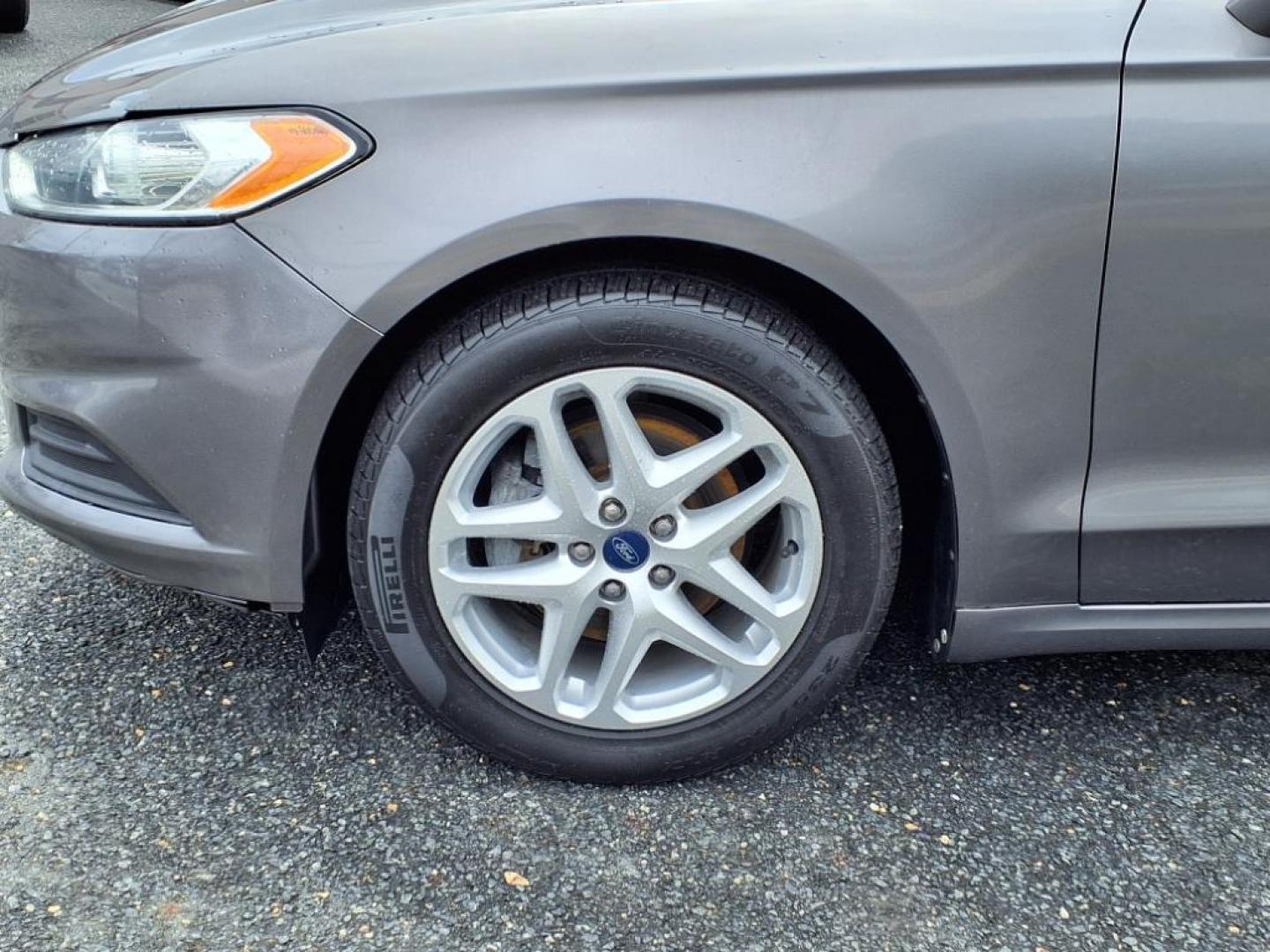 2014 Sterling Gray Metallic Ford Fusion SE (1FA6P0H79E5) with an 2.5L 4 Cylinder Sequential-Port F.I. engine, 4CYL transmission, located at 50 Eastern Blvd., Essex, MD, 21221, (410) 686-3444, 39.304367, -76.484947 - Photo#6