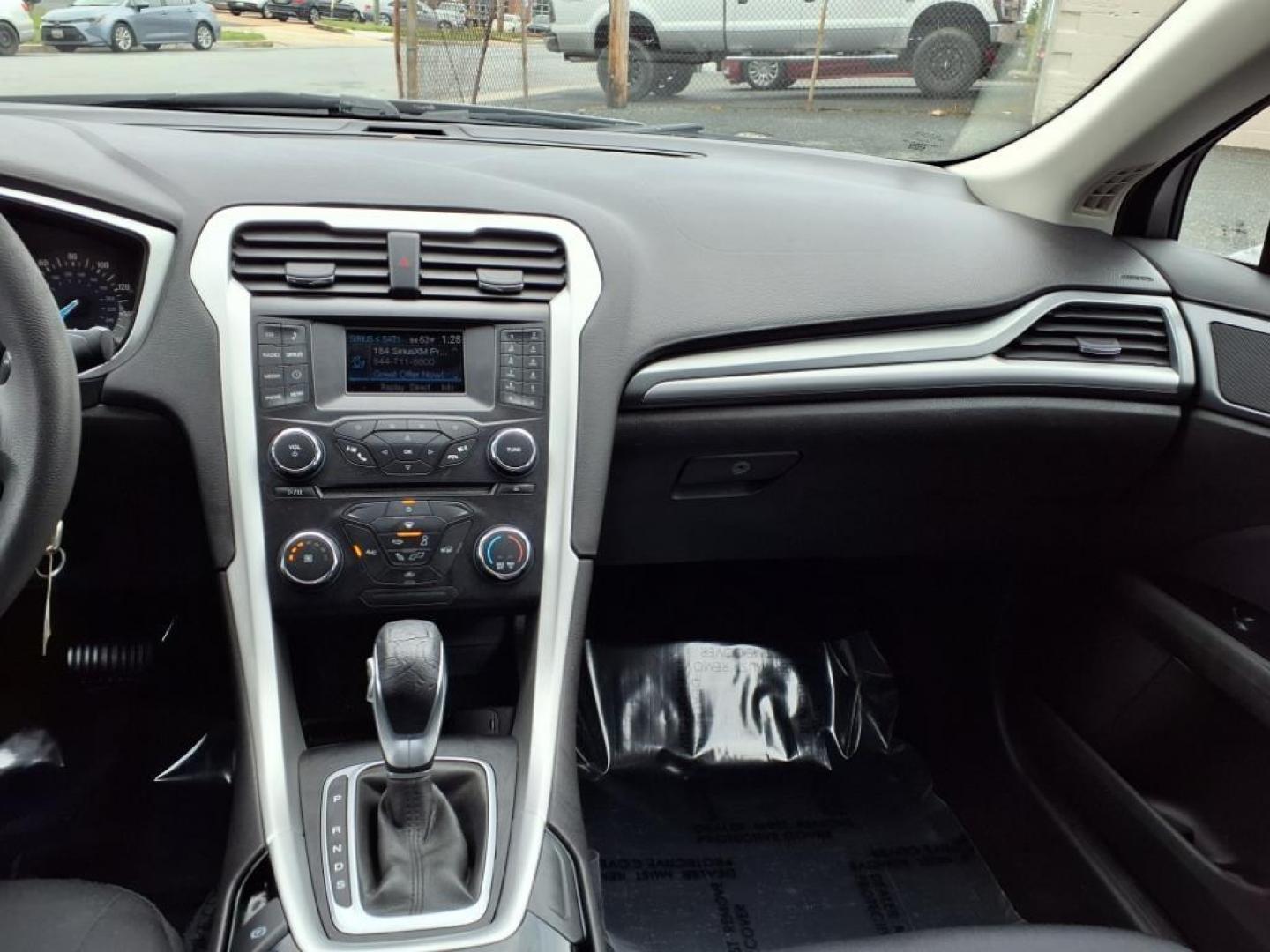2014 Sterling Gray Metallic Ford Fusion SE (1FA6P0H79E5) with an 2.5L 4 Cylinder Sequential-Port F.I. engine, 4CYL transmission, located at 50 Eastern Blvd., Essex, MD, 21221, (410) 686-3444, 39.304367, -76.484947 - Photo#13