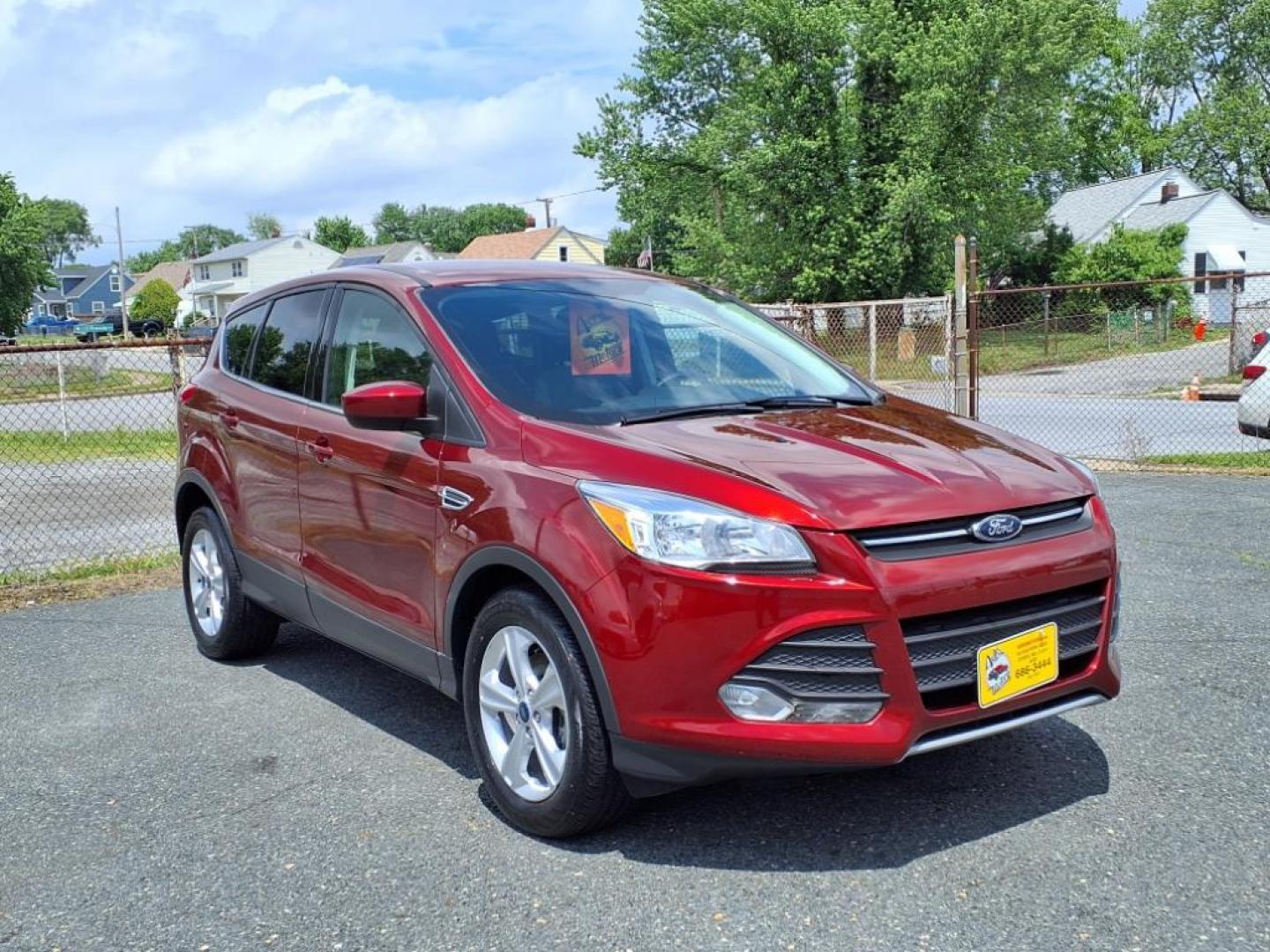 2014 Ruby Red Metallic Tinted Clearcoat Ford Escape SE (1FMCU0GX1EU) with an 1.6L 4 Cylinder Turbocharged engine, V6 AT transmission, located at 50 Eastern Blvd., Essex, MD, 21221, (410) 686-3444, 39.304367, -76.484947 - Photo#7