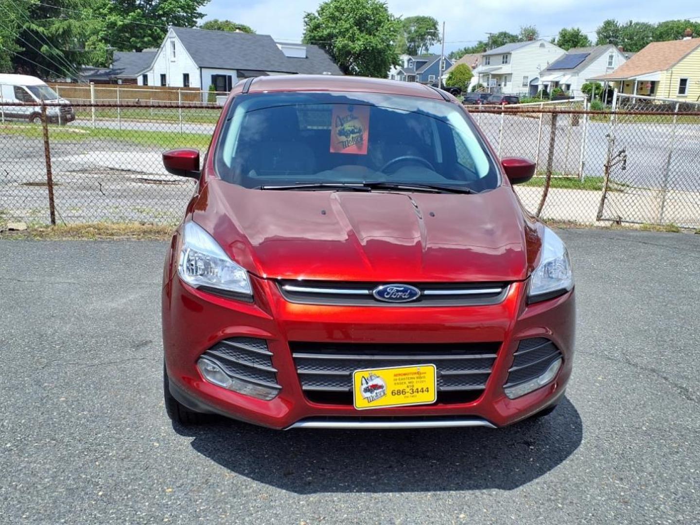 2014 Ruby Red Metallic Tinted Clearcoat Ford Escape SE (1FMCU0GX1EU) with an 1.6L 4 Cylinder Turbocharged engine, V6 AT transmission, located at 50 Eastern Blvd., Essex, MD, 21221, (410) 686-3444, 39.304367, -76.484947 - Photo#8