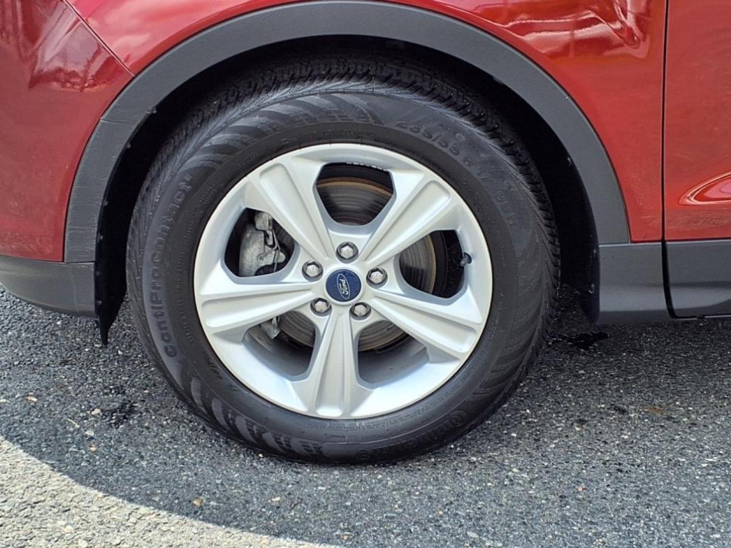 2014 Ruby Red Metallic Tinted Clearcoat Ford Escape SE (1FMCU0GX1EU) with an 1.6L 4 Cylinder Turbocharged engine, V6 AT transmission, located at 50 Eastern Blvd., Essex, MD, 21221, (410) 686-3444, 39.304367, -76.484947 - Photo#9
