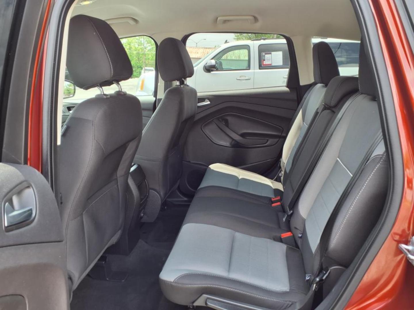 2014 Ruby Red Metallic Tinted Clearcoat Ford Escape SE (1FMCU0GX1EU) with an 1.6L 4 Cylinder Turbocharged engine, V6 AT transmission, located at 50 Eastern Blvd., Essex, MD, 21221, (410) 686-3444, 39.304367, -76.484947 - Photo#13