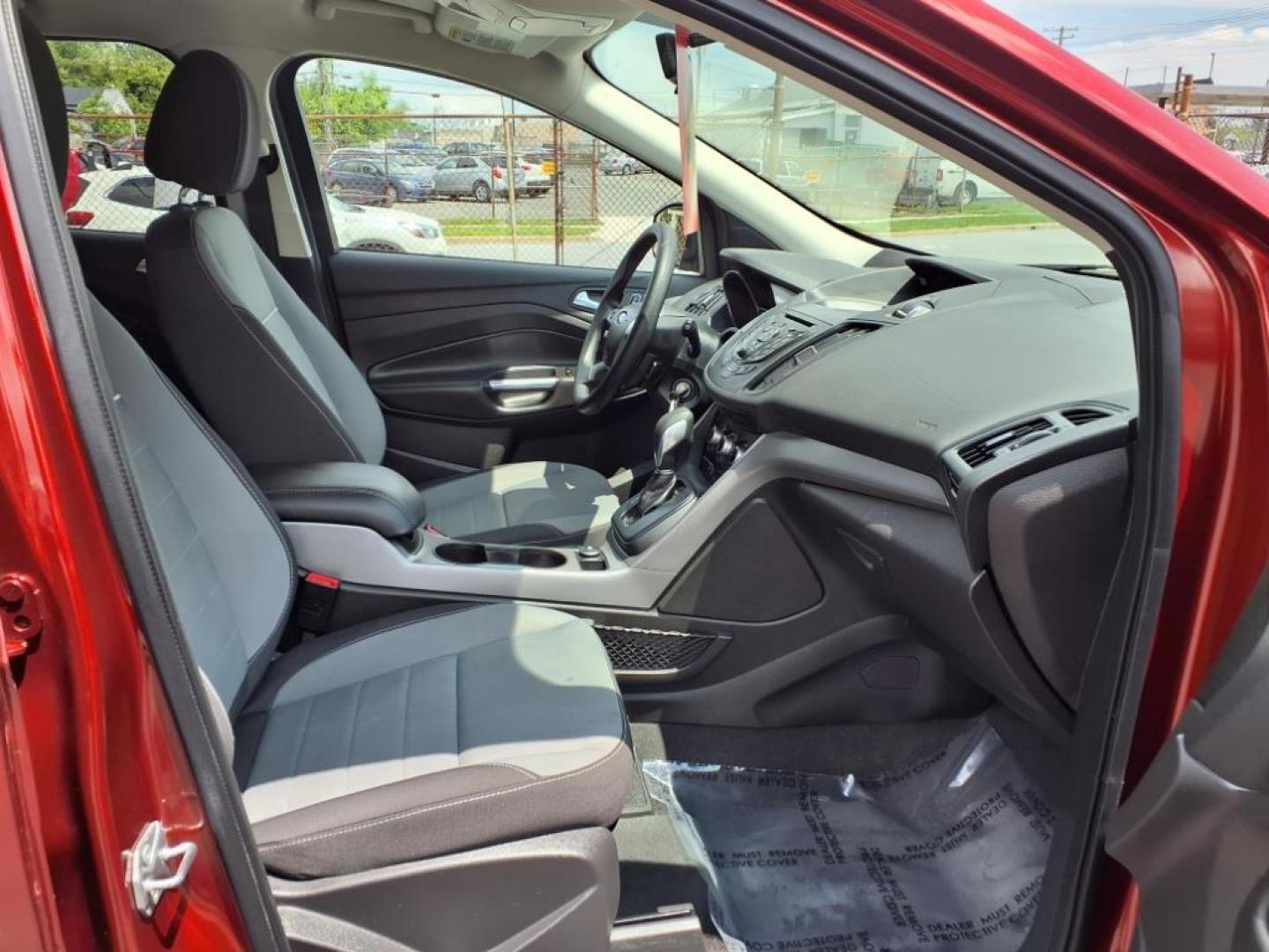 2014 Ruby Red Metallic Tinted Clearcoat Ford Escape SE (1FMCU0GX1EU) with an 1.6L 4 Cylinder Turbocharged engine, V6 AT transmission, located at 50 Eastern Blvd., Essex, MD, 21221, (410) 686-3444, 39.304367, -76.484947 - Photo#17
