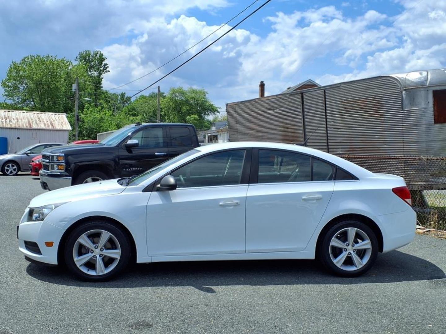 2011 White Chevrolet Cruze LS (1G1PC5SH7B7) with an 1.8L 4 Cylinder Sequential-Port F.I. engine, 4CYL transmission, located at 50 Eastern Blvd., Essex, MD, 21221, (410) 686-3444, 39.304367, -76.484947 - Photo#1