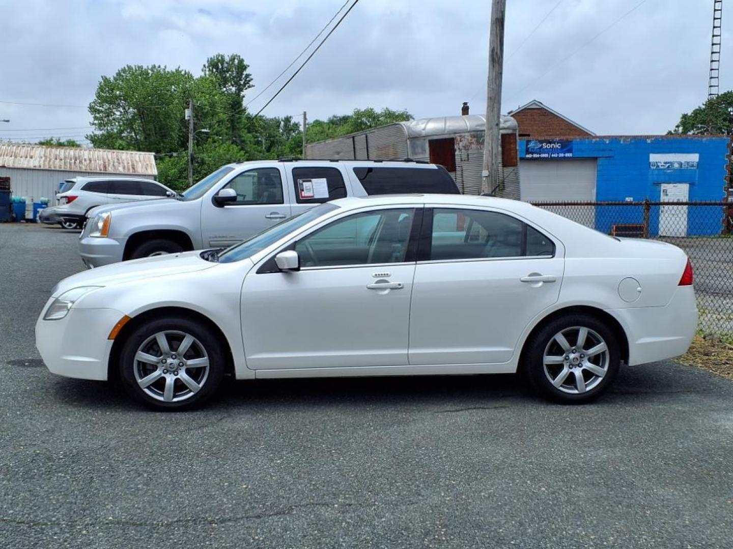 2010 White Platinum Metallic Tri-Coat Mercury Milan V6 Premier (3MEHM0JG8AR) with an 3.0L 6 Cylinder Sequential-Port F.I. engine, V6 AT transmission, located at 50 Eastern Blvd., Essex, MD, 21221, (410) 686-3444, 39.304367, -76.484947 - Photo#1