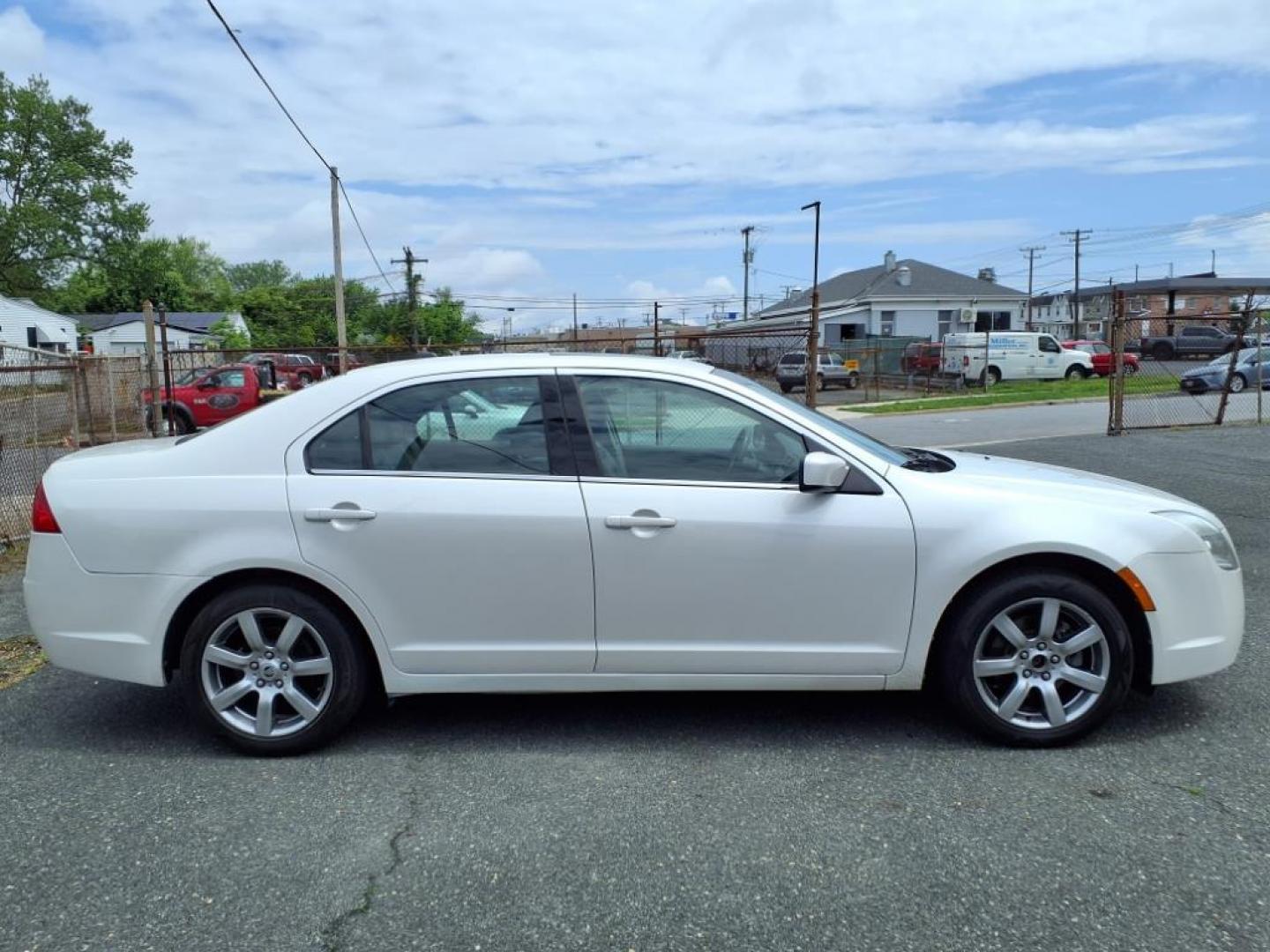 2010 White Platinum Metallic Tri-Coat Mercury Milan V6 Premier (3MEHM0JG8AR) with an 3.0L 6 Cylinder Sequential-Port F.I. engine, V6 AT transmission, located at 50 Eastern Blvd., Essex, MD, 21221, (410) 686-3444, 39.304367, -76.484947 - Photo#5