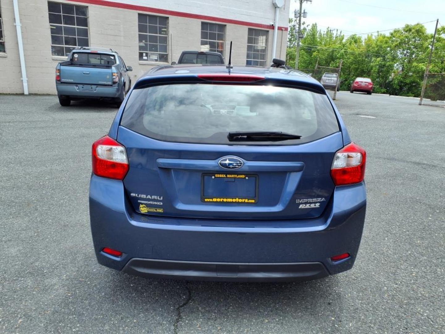 2012 Marine Blue Pearl Subaru Impreza 2.0i (JF1GPAA67CH) with an 2.0L 2.0L H4 148hp 145ft. lbs. Sequential-Port F.I. engine, CVT transmission, located at 50 Eastern Blvd., Essex, MD, 21221, (410) 686-3444, 39.304367, -76.484947 - Photo#3