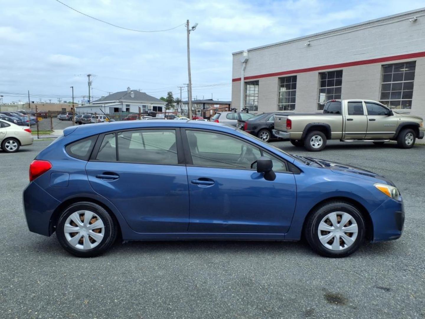 2012 Marine Blue Pearl Subaru Impreza 2.0i (JF1GPAA67CH) with an 2.0L 2.0L H4 148hp 145ft. lbs. Sequential-Port F.I. engine, CVT transmission, located at 50 Eastern Blvd., Essex, MD, 21221, (410) 686-3444, 39.304367, -76.484947 - Photo#6