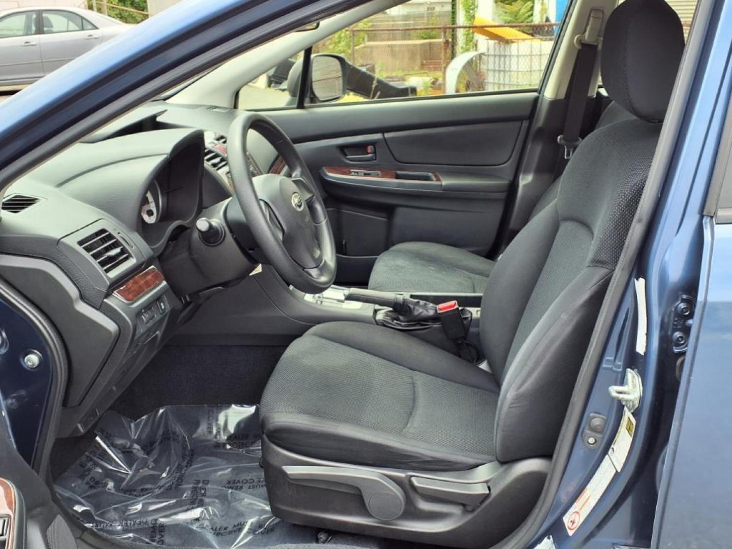 2012 Marine Blue Pearl Subaru Impreza 2.0i (JF1GPAA67CH) with an 2.0L 2.0L H4 148hp 145ft. lbs. Sequential-Port F.I. engine, CVT transmission, located at 50 Eastern Blvd., Essex, MD, 21221, (410) 686-3444, 39.304367, -76.484947 - Photo#11
