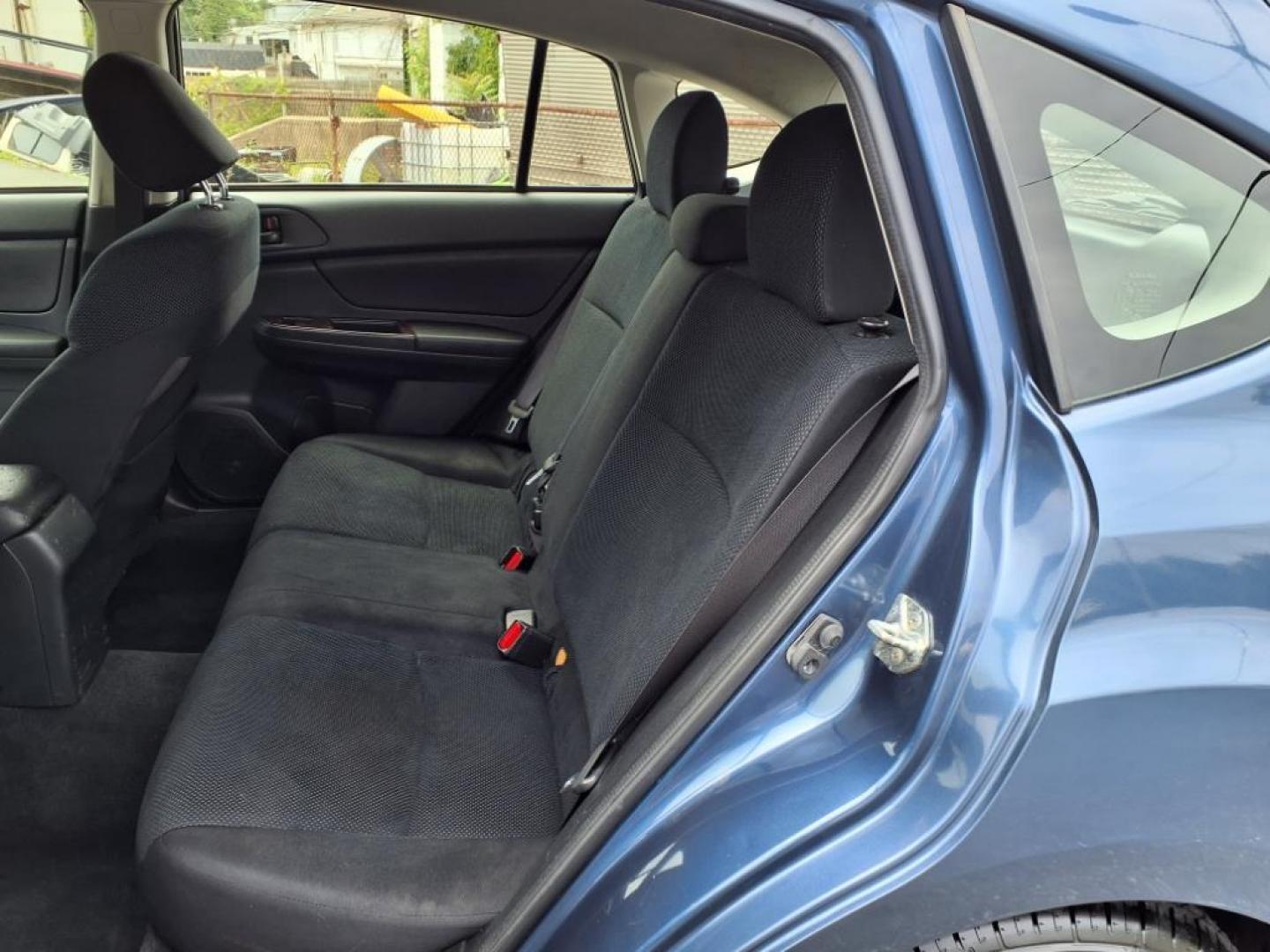 2012 Marine Blue Pearl Subaru Impreza 2.0i (JF1GPAA67CH) with an 2.0L 2.0L H4 148hp 145ft. lbs. Sequential-Port F.I. engine, CVT transmission, located at 50 Eastern Blvd., Essex, MD, 21221, (410) 686-3444, 39.304367, -76.484947 - Photo#12