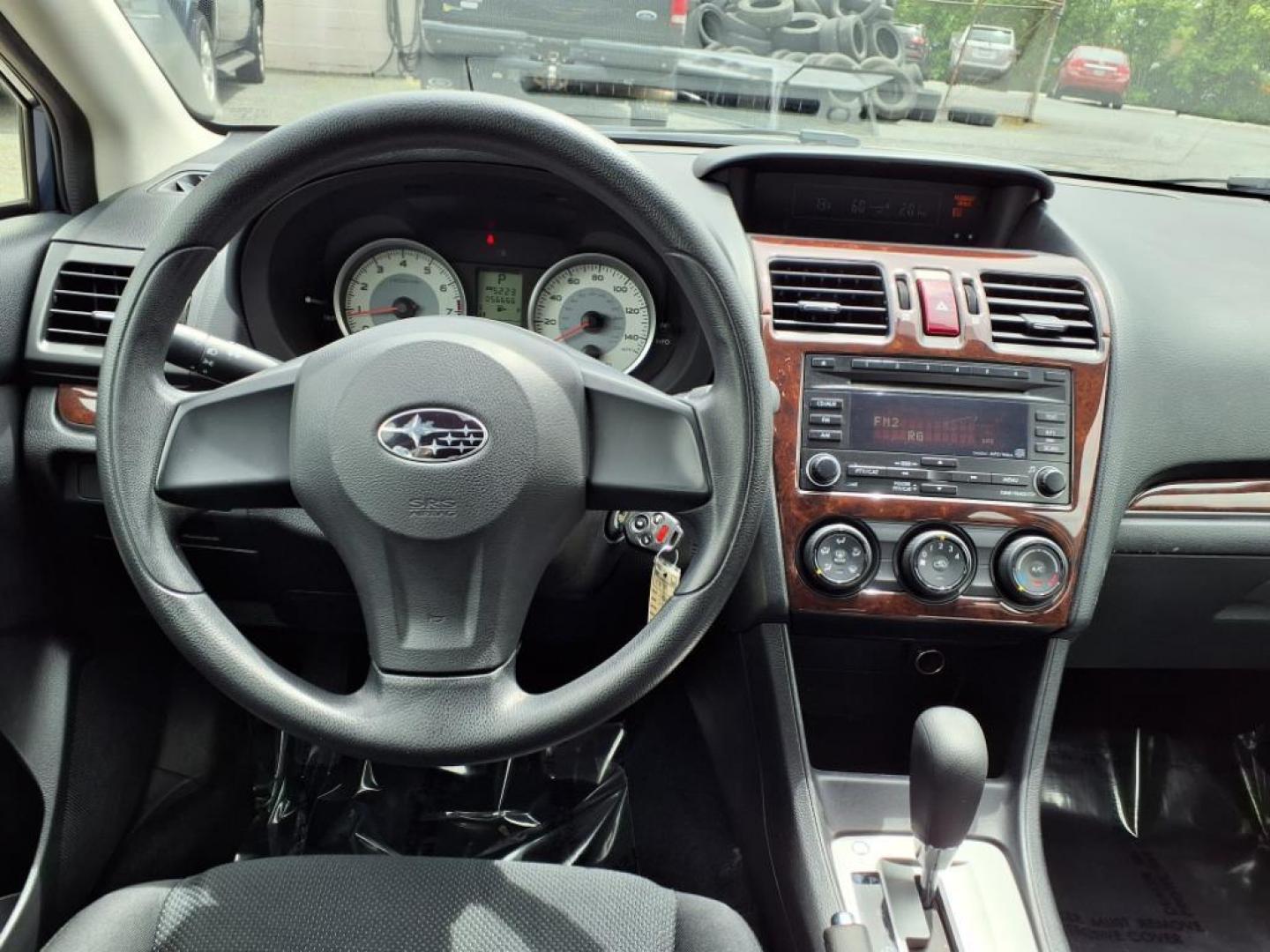 2012 Marine Blue Pearl Subaru Impreza 2.0i (JF1GPAA67CH) with an 2.0L 2.0L H4 148hp 145ft. lbs. Sequential-Port F.I. engine, CVT transmission, located at 50 Eastern Blvd., Essex, MD, 21221, (410) 686-3444, 39.304367, -76.484947 - Photo#13