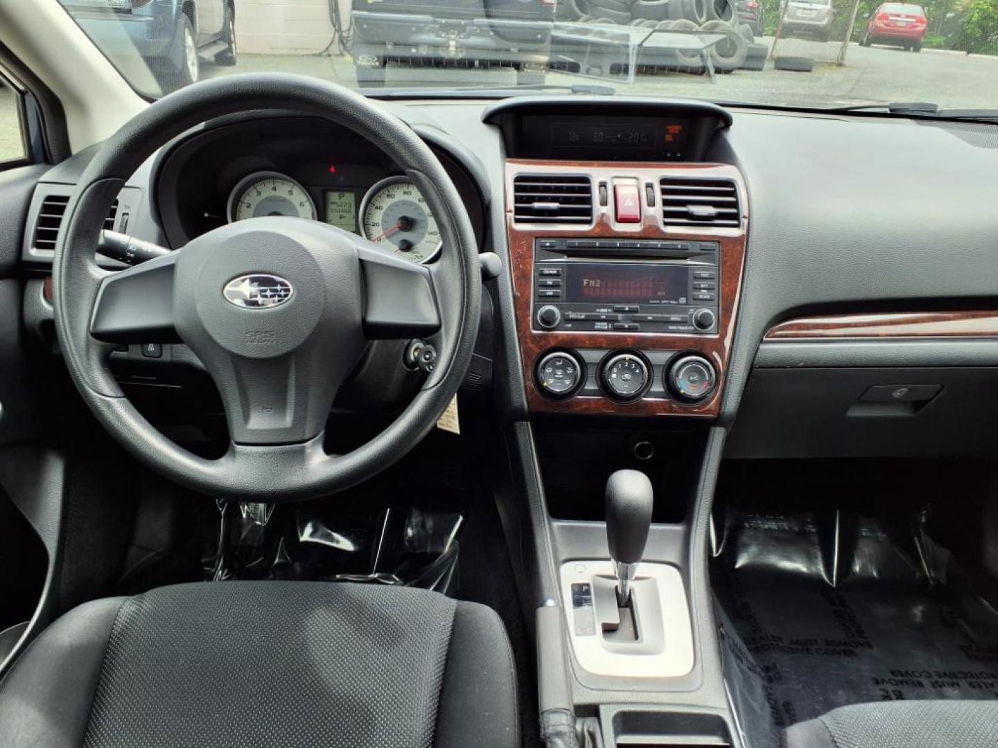 2012 Marine Blue Pearl Subaru Impreza 2.0i (JF1GPAA67CH) with an 2.0L 2.0L H4 148hp 145ft. lbs. Sequential-Port F.I. engine, CVT transmission, located at 50 Eastern Blvd., Essex, MD, 21221, (410) 686-3444, 39.304367, -76.484947 - Photo#14