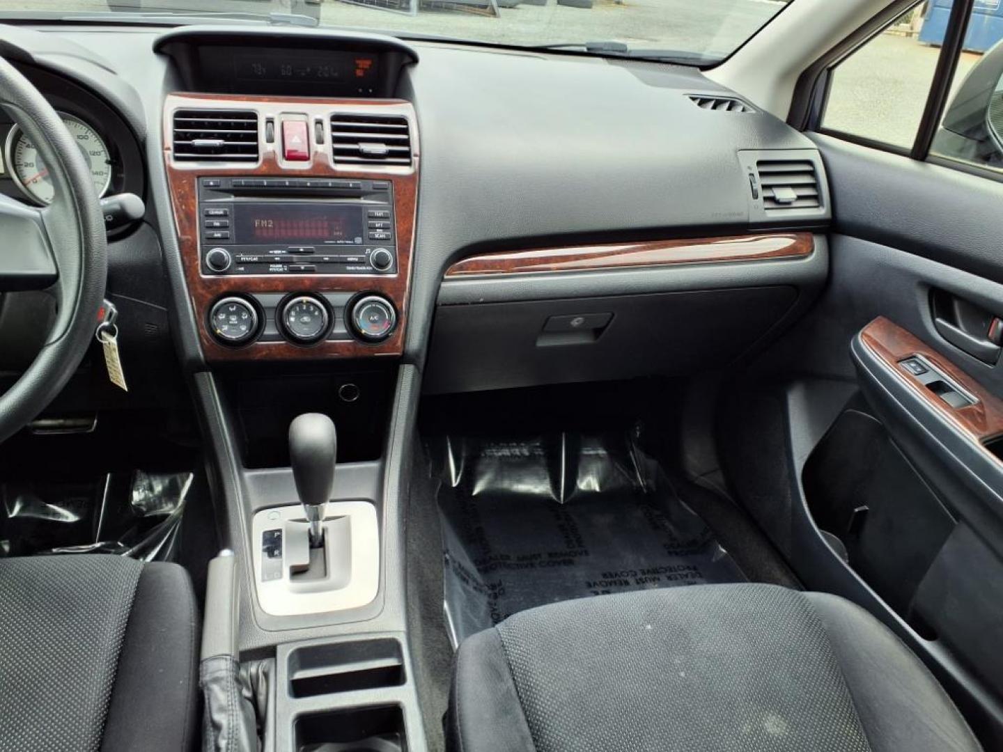 2012 Marine Blue Pearl Subaru Impreza 2.0i (JF1GPAA67CH) with an 2.0L 2.0L H4 148hp 145ft. lbs. Sequential-Port F.I. engine, CVT transmission, located at 50 Eastern Blvd., Essex, MD, 21221, (410) 686-3444, 39.304367, -76.484947 - Photo#15