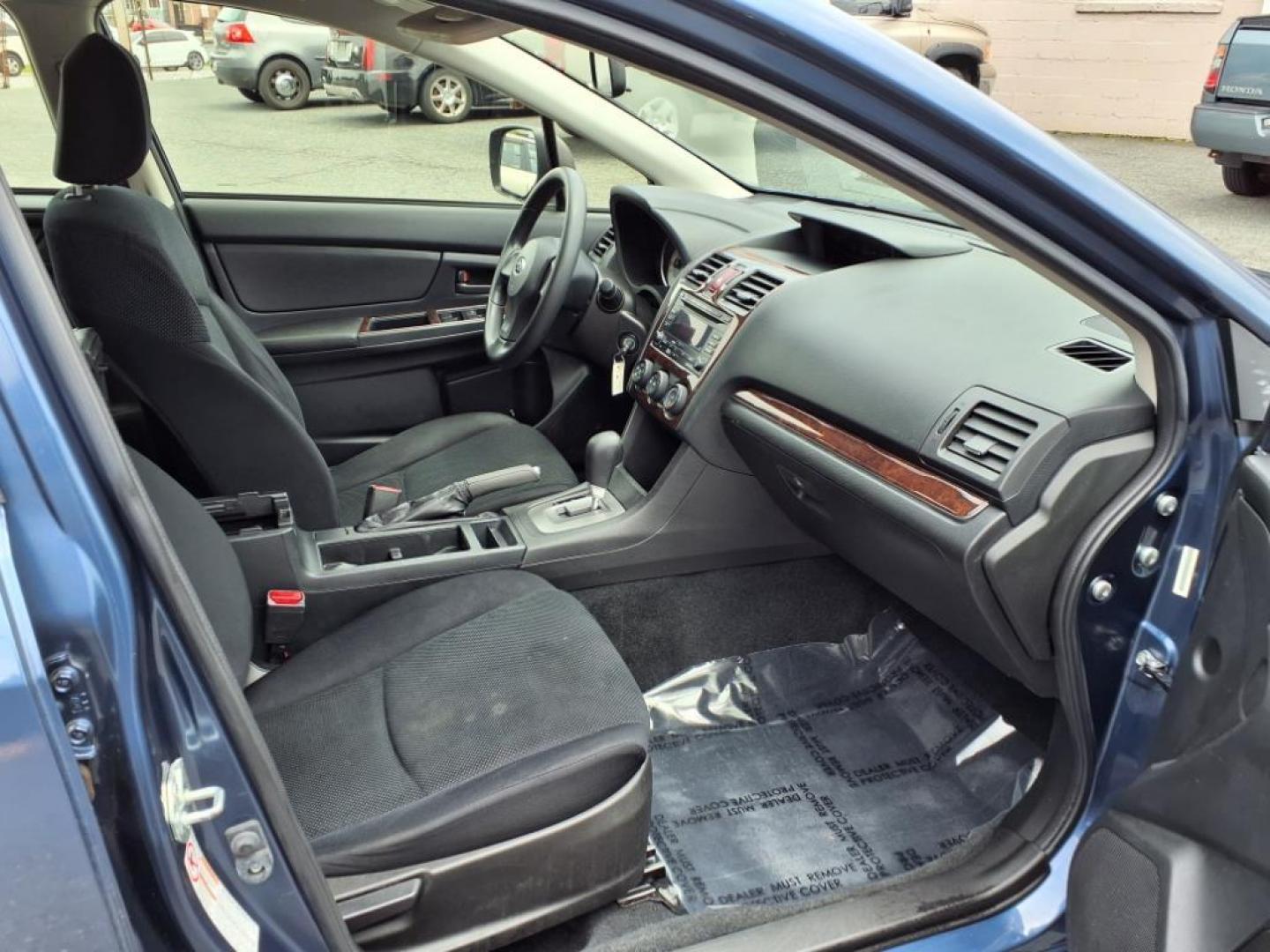 2012 Marine Blue Pearl Subaru Impreza 2.0i (JF1GPAA67CH) with an 2.0L 2.0L H4 148hp 145ft. lbs. Sequential-Port F.I. engine, CVT transmission, located at 50 Eastern Blvd., Essex, MD, 21221, (410) 686-3444, 39.304367, -76.484947 - Photo#16