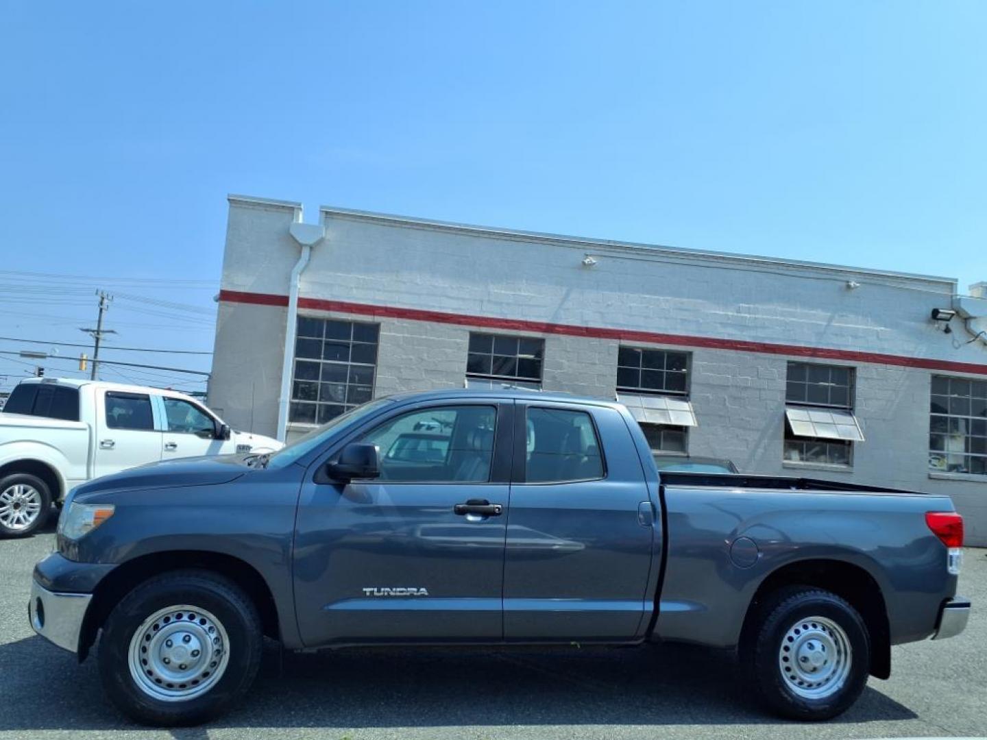2010 Blue Toyota Tundra (5TFRU5F18AX) with an 4.0L 6 Cylinder Sequential Fuel Injection engine, Automatic transmission, located at 50 Eastern Blvd., Essex, MD, 21221, (410) 686-3444, 39.304367, -76.484947 - Photo#1