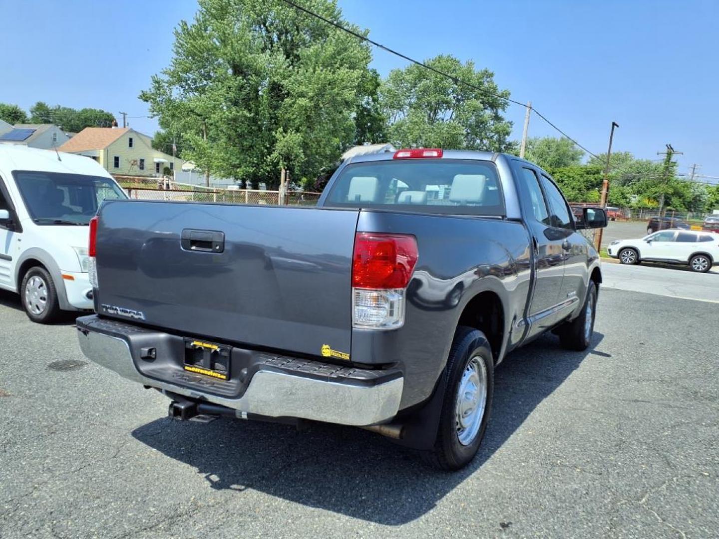 2010 Blue Toyota Tundra (5TFRU5F18AX) with an 4.0L 6 Cylinder Sequential Fuel Injection engine, Automatic transmission, located at 50 Eastern Blvd., Essex, MD, 21221, (410) 686-3444, 39.304367, -76.484947 - Photo#4