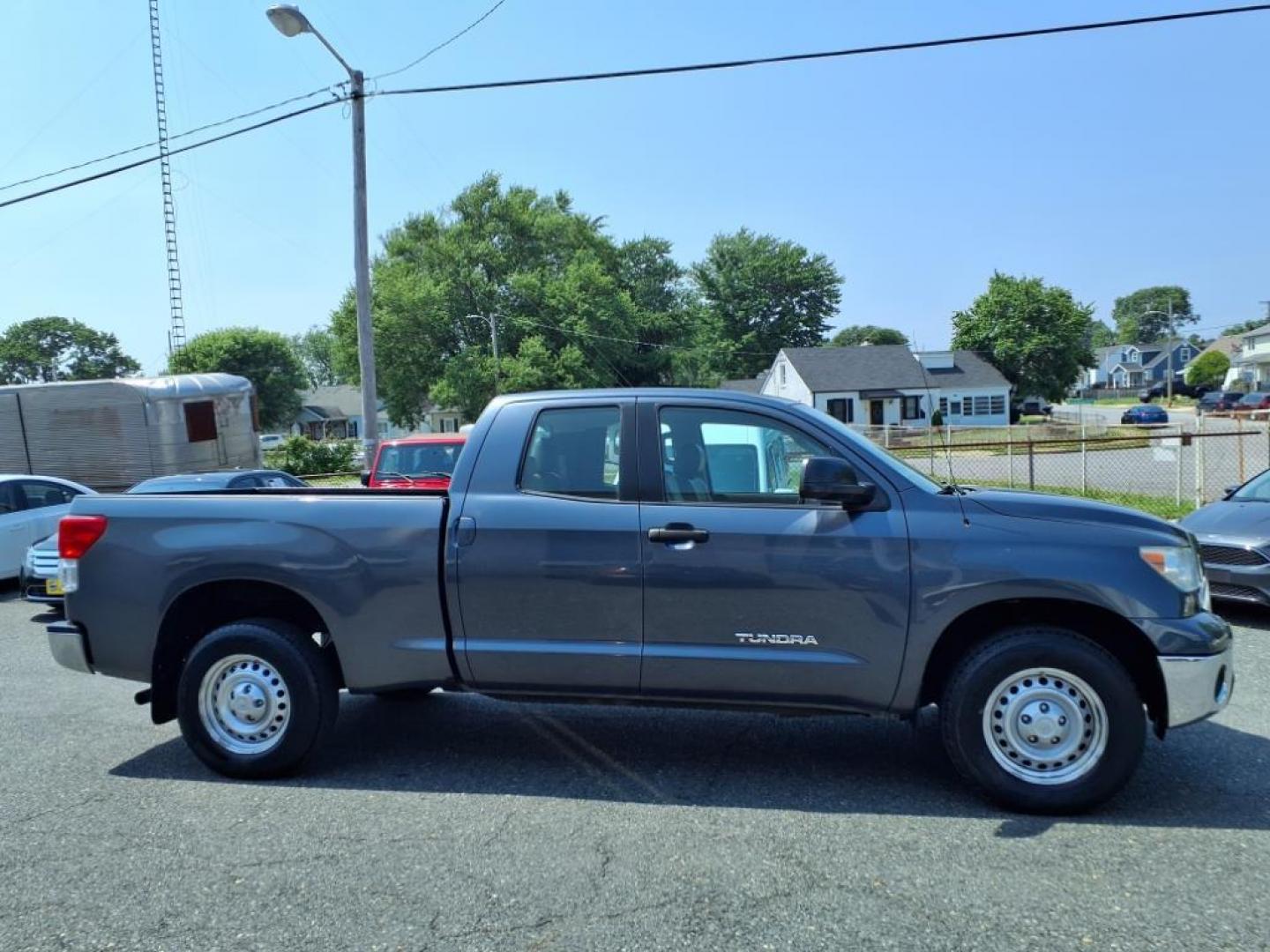 2010 Blue Toyota Tundra (5TFRU5F18AX) with an 4.0L 6 Cylinder Sequential Fuel Injection engine, Automatic transmission, located at 50 Eastern Blvd., Essex, MD, 21221, (410) 686-3444, 39.304367, -76.484947 - Photo#5