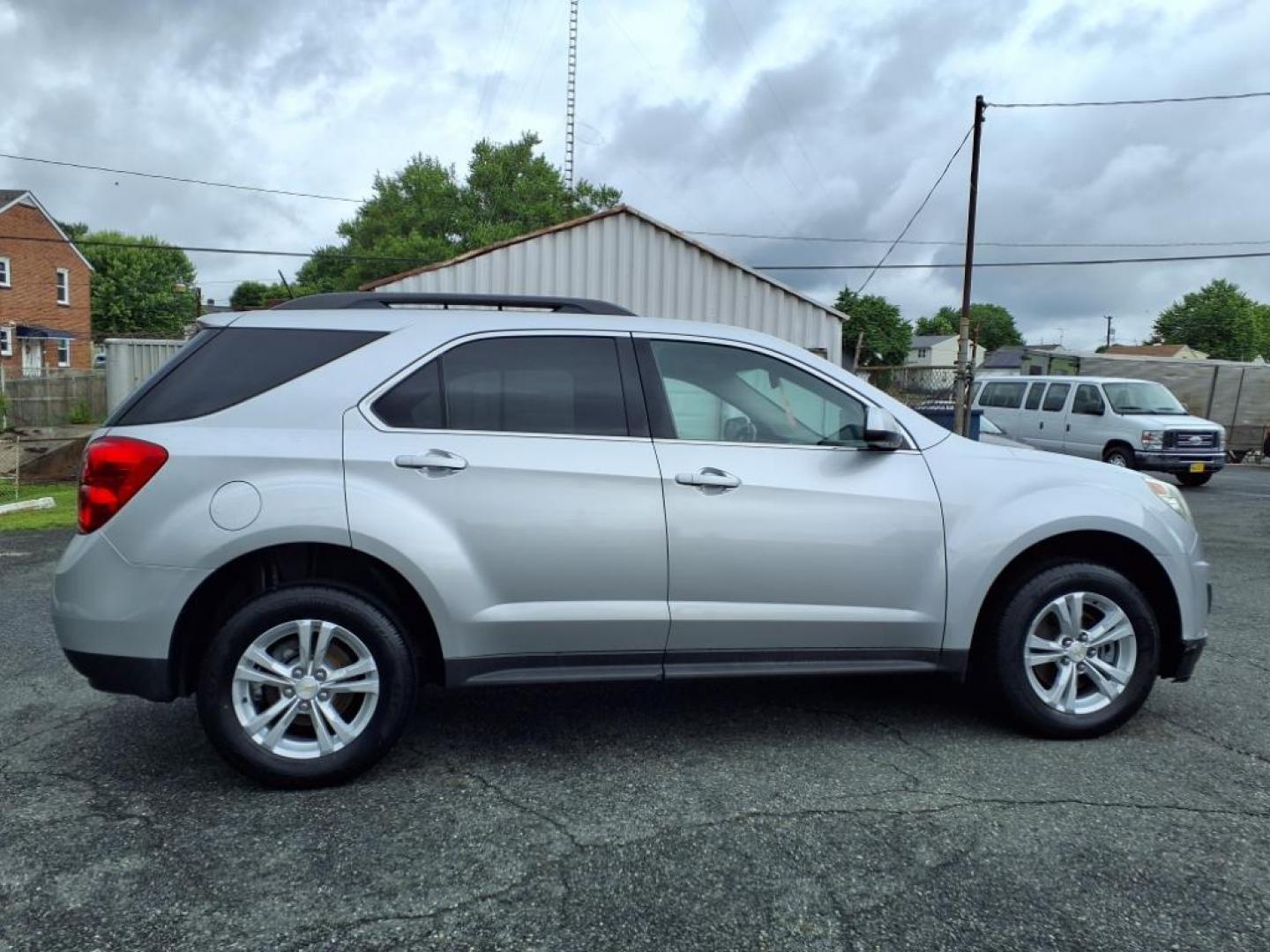 2015 Silver Chevrolet Equinox LT (2GNALBEK2F6) with an 2.4L 2.4L I4 182hp 172ft. lbs. Fuel Injected engine, 6-Speed Shiftable Automatic transmission, located at 50 Eastern Blvd., Essex, MD, 21221, (410) 686-3444, 39.304367, -76.484947 - Photo#1