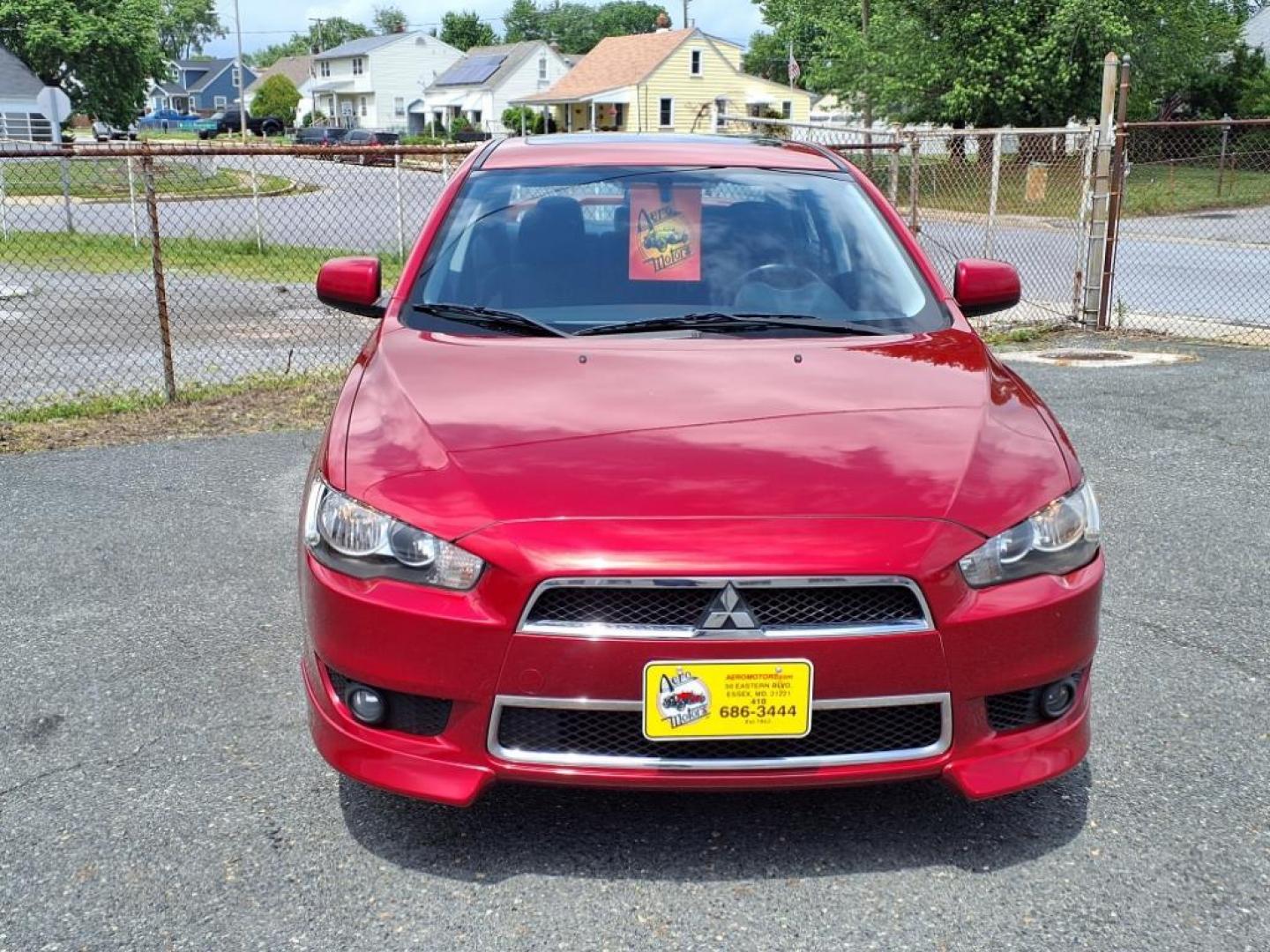 2009 Rally Red Metallic Mitsubishi Lancer ES Sport (JA3AU26U29U) with an 2.0L 2.0L I4 152hp 146ft. lbs. Sequential-Port F.I. engine, CVT transmission, located at 50 Eastern Blvd., Essex, MD, 21221, (410) 686-3444, 39.304367, -76.484947 - Photo#7