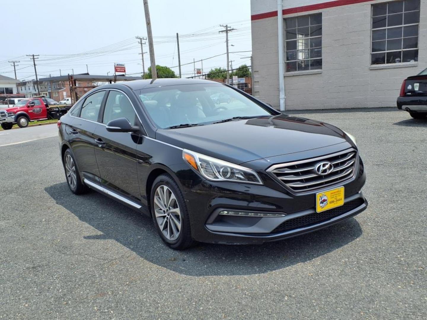 2015 Phantom Black Hyundai SONATA Limited (5NPE34AF1FH) with an 2.4L 2.4L I4 185hp 178ft. lbs. Fuel Injected engine, 6-Speed Shiftable Automatic transmission, located at 50 Eastern Blvd., Essex, MD, 21221, (410) 686-3444, 39.304367, -76.484947 - Photo#6