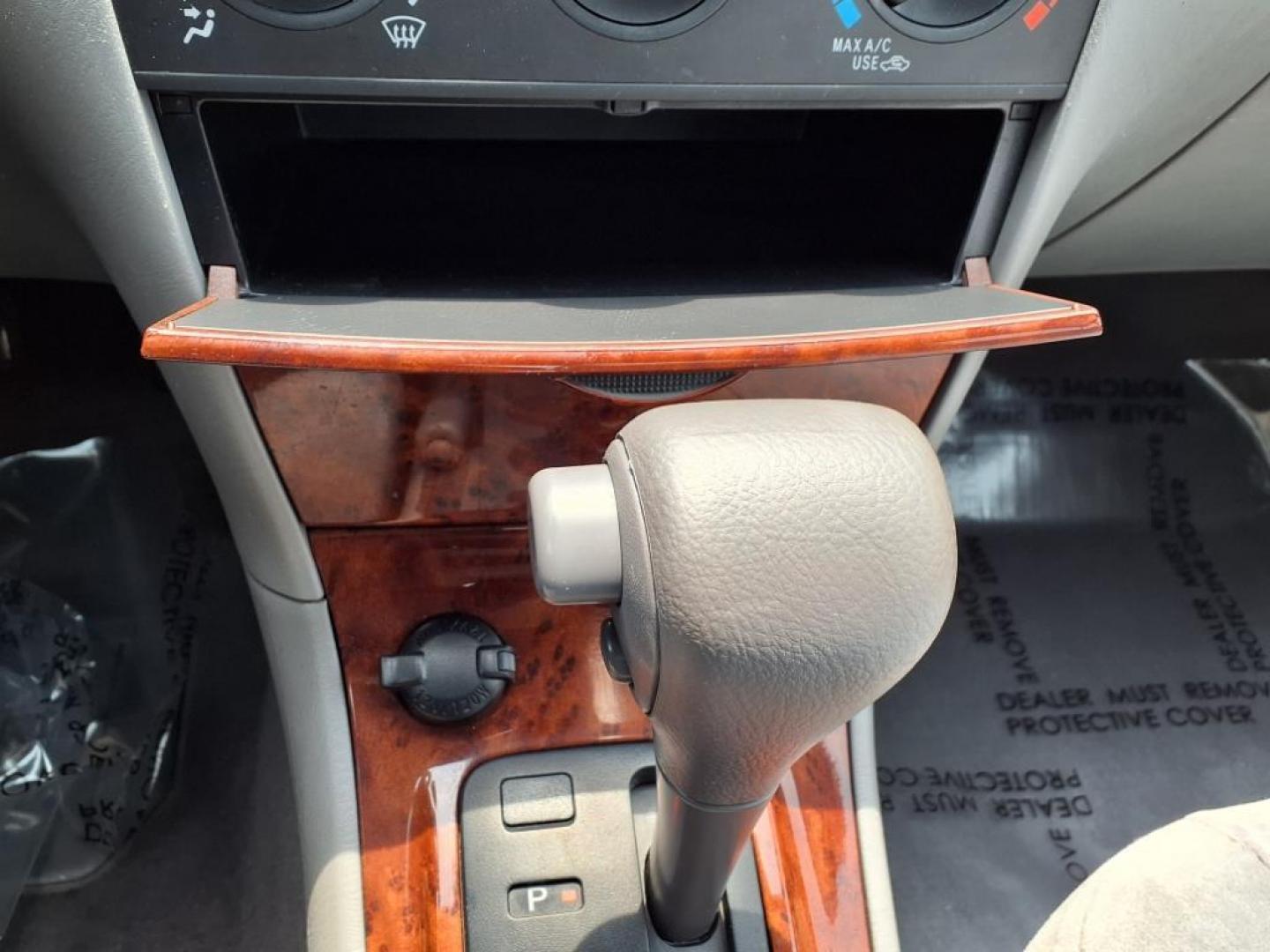 2006 Silver Streak Mica Toyota Corolla LE (JTDBR32E360) with an 1.8L 1L NA I4 double overhead cam (DOHC) 16V Fuel Injected engine, 4-Speed Automatic transmission, located at 50 Eastern Blvd., Essex, MD, 21221, (410) 686-3444, 39.304367, -76.484947 - Photo#18