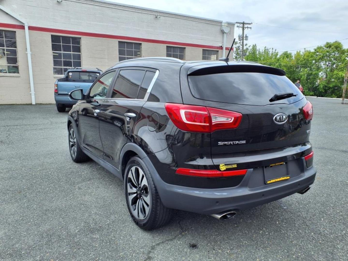 2012 Black Kia Sportage SX (KNDPC3A68C7) with an 2.0L 2.0L Turbo I4 260hp 269ft. lbs. Turbocharged engine, 6-Speed Automatic Sportmatic transmission, located at 50 Eastern Blvd., Essex, MD, 21221, (410) 686-3444, 39.304367, -76.484947 - Photo#2