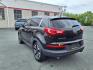 2012 Black Kia Sportage SX (KNDPC3A68C7) with an 2.0L 2.0L Turbo I4 260hp 269ft. lbs. Turbocharged engine, 6-Speed Automatic Sportmatic transmission, located at 50 Eastern Blvd., Essex, MD, 21221, (410) 686-3444, 39.304367, -76.484947 - Photo#2