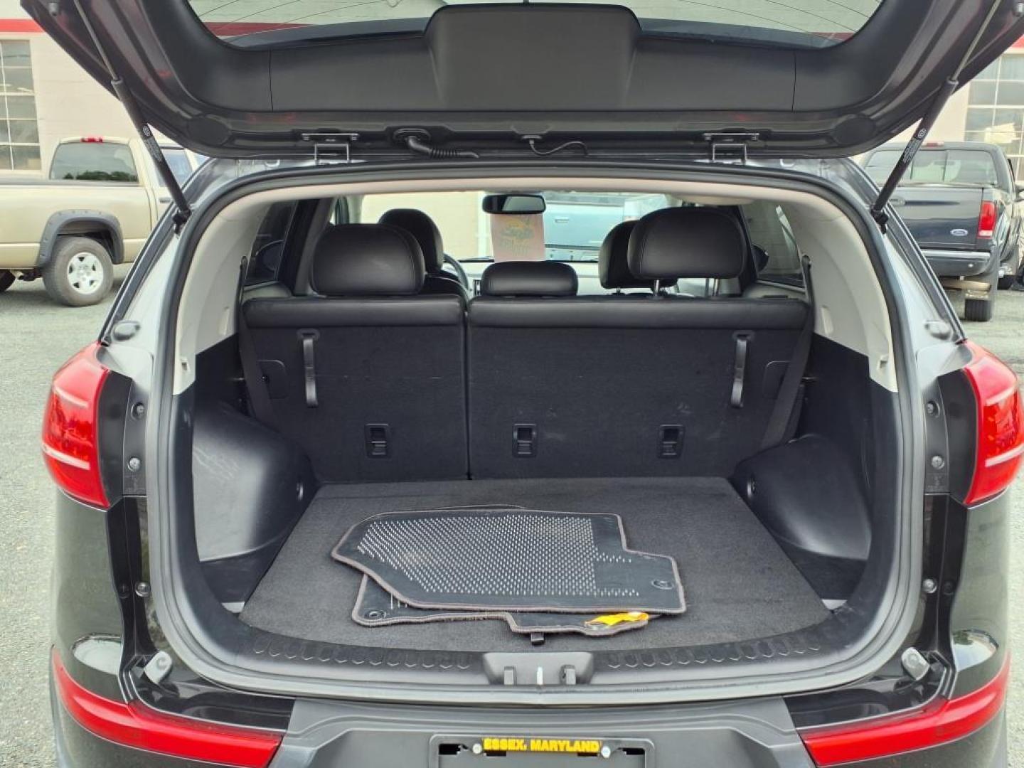 2012 Black Kia Sportage SX (KNDPC3A68C7) with an 2.0L 2.0L Turbo I4 260hp 269ft. lbs. Turbocharged engine, 6-Speed Automatic Sportmatic transmission, located at 50 Eastern Blvd., Essex, MD, 21221, (410) 686-3444, 39.304367, -76.484947 - Photo#4