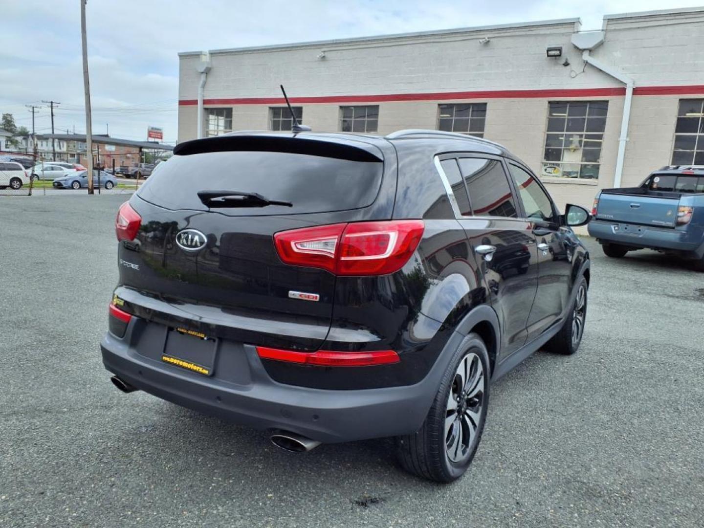 2012 Black Kia Sportage SX (KNDPC3A68C7) with an 2.0L 2.0L Turbo I4 260hp 269ft. lbs. Turbocharged engine, 6-Speed Automatic Sportmatic transmission, located at 50 Eastern Blvd., Essex, MD, 21221, (410) 686-3444, 39.304367, -76.484947 - Photo#5