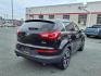 2012 Black Kia Sportage SX (KNDPC3A68C7) with an 2.0L 2.0L Turbo I4 260hp 269ft. lbs. Turbocharged engine, 6-Speed Automatic Sportmatic transmission, located at 50 Eastern Blvd., Essex, MD, 21221, (410) 686-3444, 39.304367, -76.484947 - Photo#5