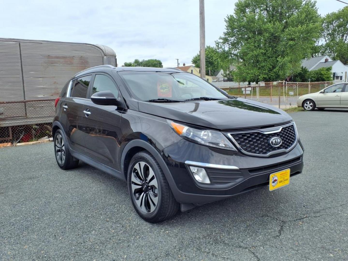 2012 Black Kia Sportage SX (KNDPC3A68C7) with an 2.0L 2.0L Turbo I4 260hp 269ft. lbs. Turbocharged engine, 6-Speed Automatic Sportmatic transmission, located at 50 Eastern Blvd., Essex, MD, 21221, (410) 686-3444, 39.304367, -76.484947 - Photo#7