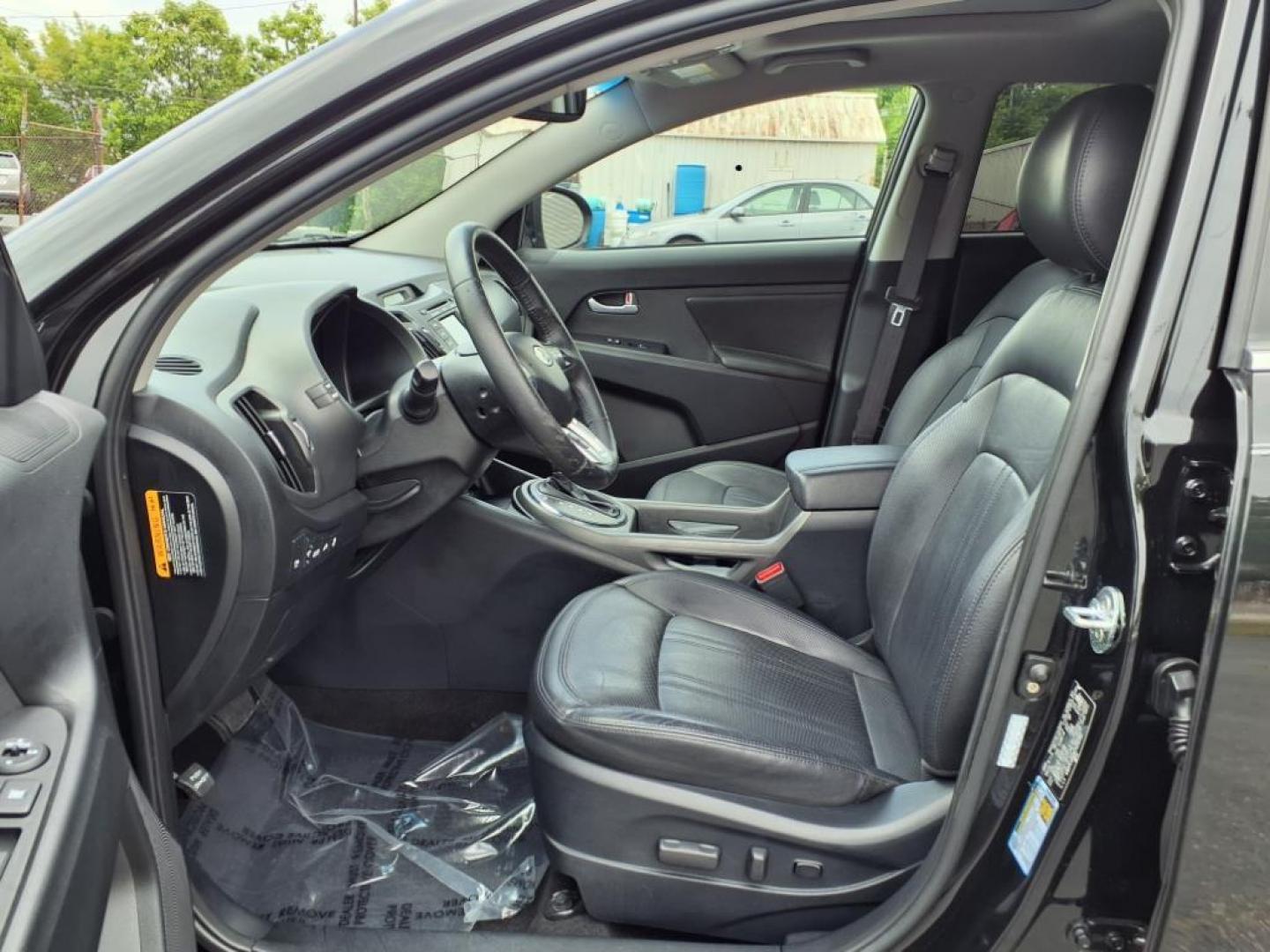 2012 Black Kia Sportage SX (KNDPC3A68C7) with an 2.0L 2.0L Turbo I4 260hp 269ft. lbs. Turbocharged engine, 6-Speed Automatic Sportmatic transmission, located at 50 Eastern Blvd., Essex, MD, 21221, (410) 686-3444, 39.304367, -76.484947 - Photo#12