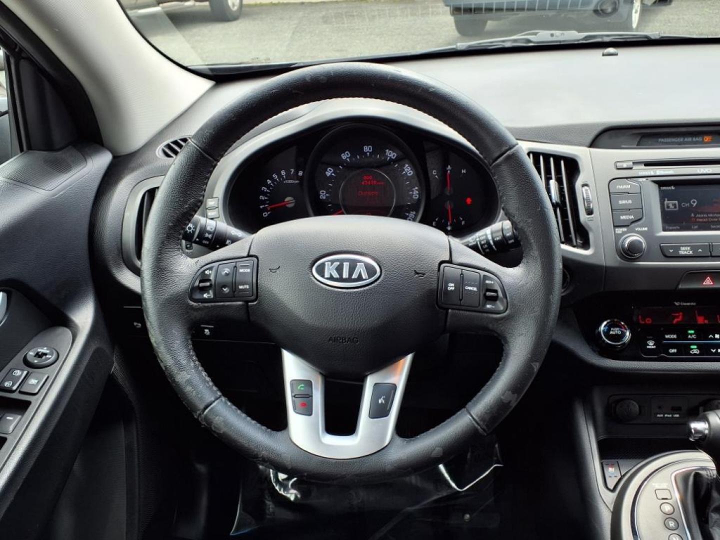 2012 Black Kia Sportage SX (KNDPC3A68C7) with an 2.0L 2.0L Turbo I4 260hp 269ft. lbs. Turbocharged engine, 6-Speed Automatic Sportmatic transmission, located at 50 Eastern Blvd., Essex, MD, 21221, (410) 686-3444, 39.304367, -76.484947 - Photo#14