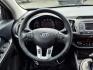 2012 Black Kia Sportage SX (KNDPC3A68C7) with an 2.0L 2.0L Turbo I4 260hp 269ft. lbs. Turbocharged engine, 6-Speed Automatic Sportmatic transmission, located at 50 Eastern Blvd., Essex, MD, 21221, (410) 686-3444, 39.304367, -76.484947 - Photo#14