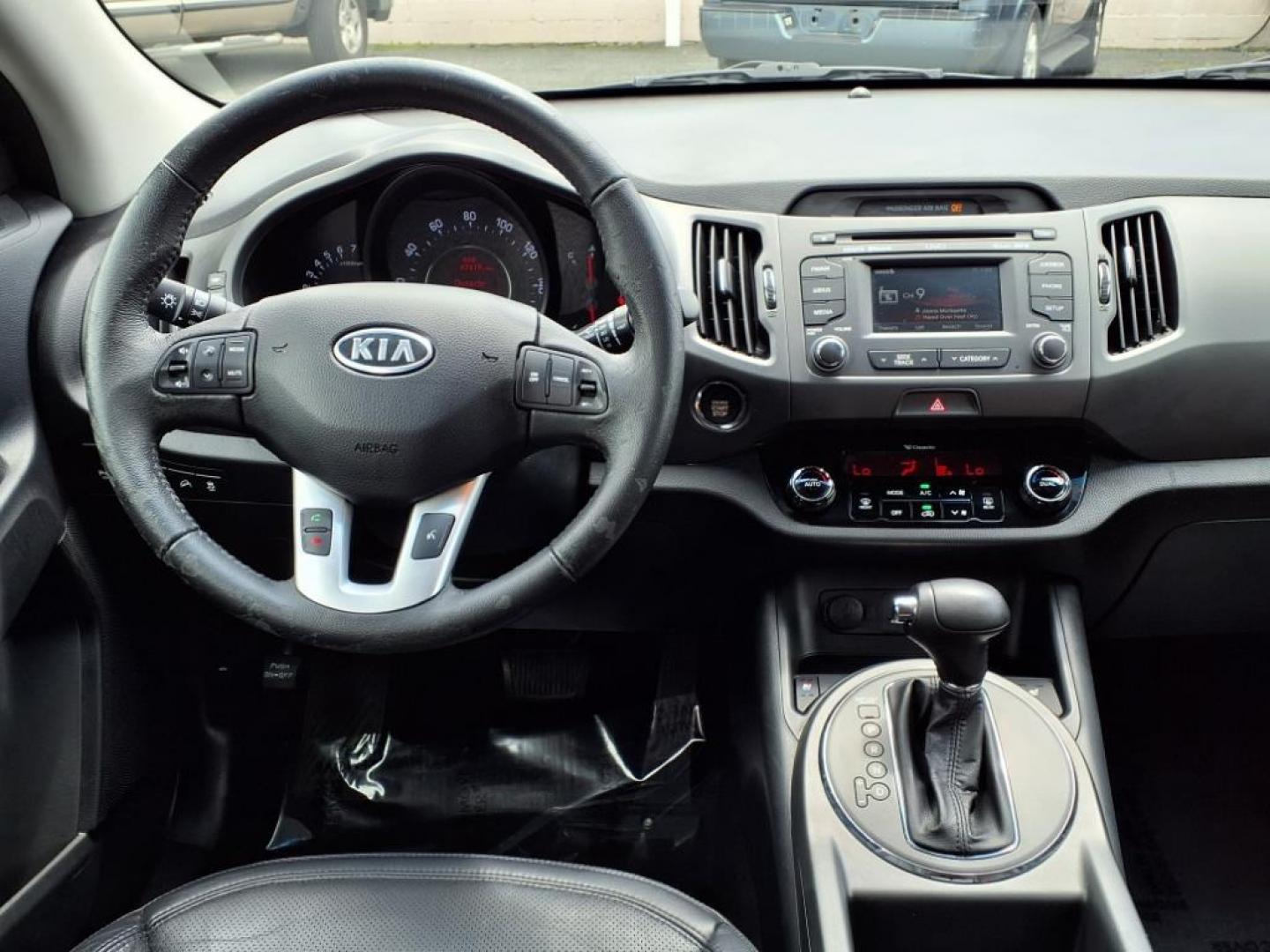 2012 Black Kia Sportage SX (KNDPC3A68C7) with an 2.0L 2.0L Turbo I4 260hp 269ft. lbs. Turbocharged engine, 6-Speed Automatic Sportmatic transmission, located at 50 Eastern Blvd., Essex, MD, 21221, (410) 686-3444, 39.304367, -76.484947 - Photo#15