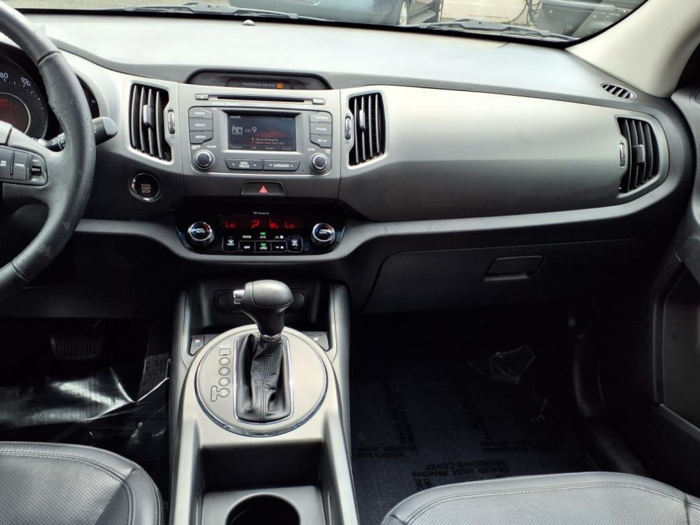 2012 Black Kia Sportage SX (KNDPC3A68C7) with an 2.0L 2.0L Turbo I4 260hp 269ft. lbs. Turbocharged engine, 6-Speed Automatic Sportmatic transmission, located at 50 Eastern Blvd., Essex, MD, 21221, (410) 686-3444, 39.304367, -76.484947 - Photo#16