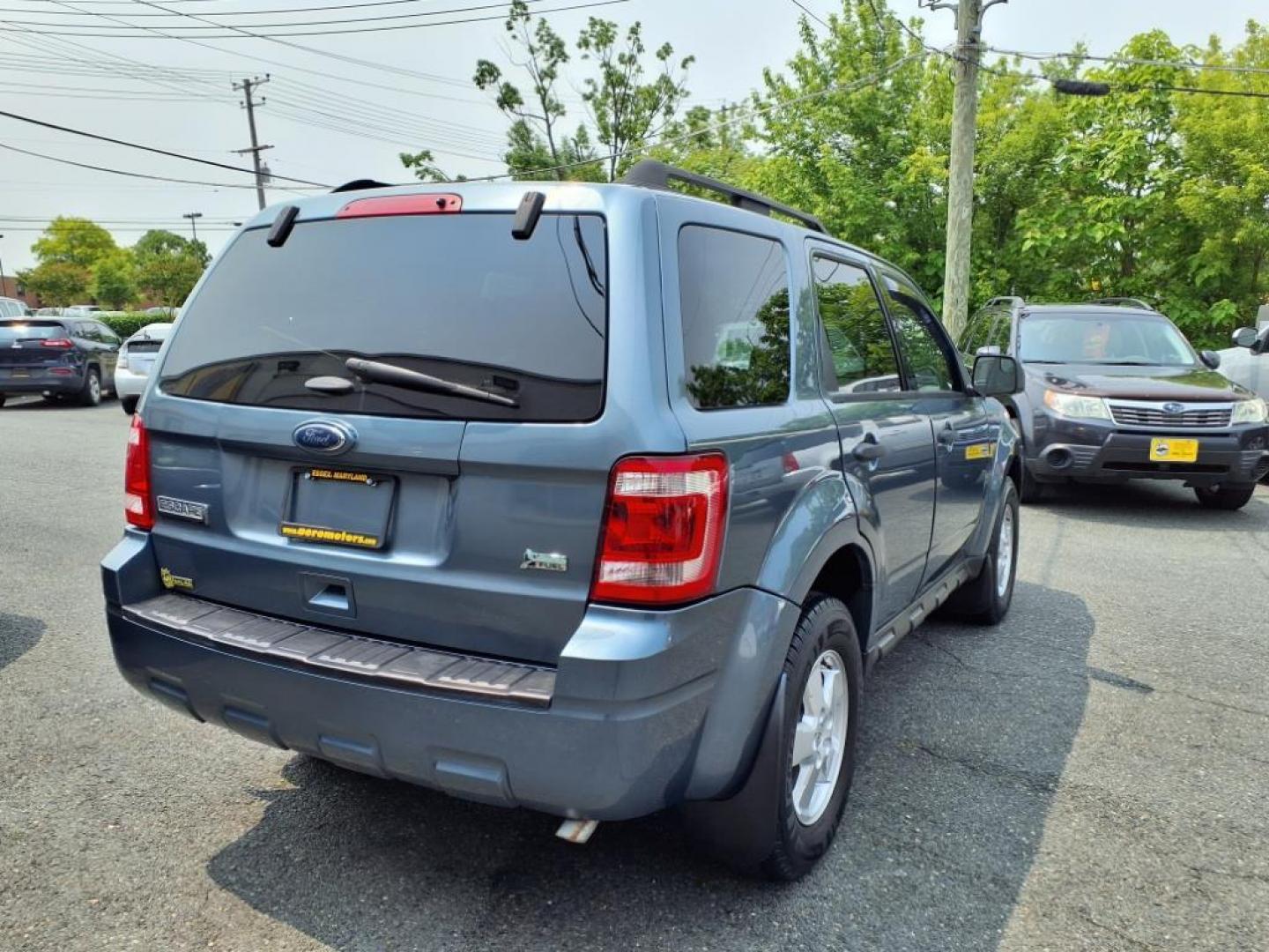2012 Steel Blue Metallic Ford Escape XLT (1FMCU9DGXCK) with an 3.0L 3.0L Flex Fuel V6 240hp 223ft. lbs. Sequential-Port F.I. engine, 6-Speed Automatic transmission, located at 50 Eastern Blvd., Essex, MD, 21221, (410) 686-3444, 39.304367, -76.484947 - Photo#5