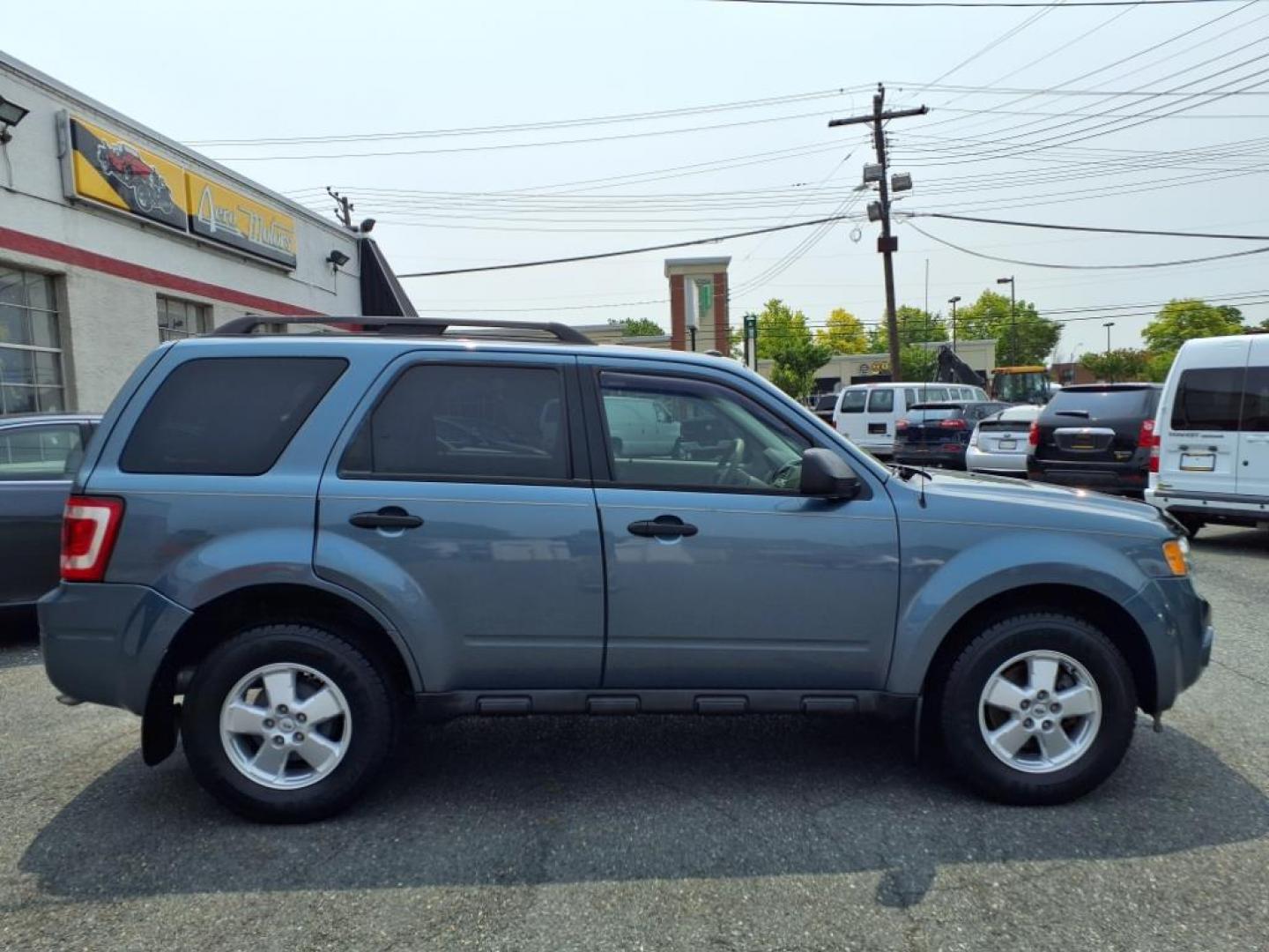 2012 Steel Blue Metallic Ford Escape XLT (1FMCU9DGXCK) with an 3.0L 3.0L Flex Fuel V6 240hp 223ft. lbs. Sequential-Port F.I. engine, 6-Speed Automatic transmission, located at 50 Eastern Blvd., Essex, MD, 21221, (410) 686-3444, 39.304367, -76.484947 - Photo#6