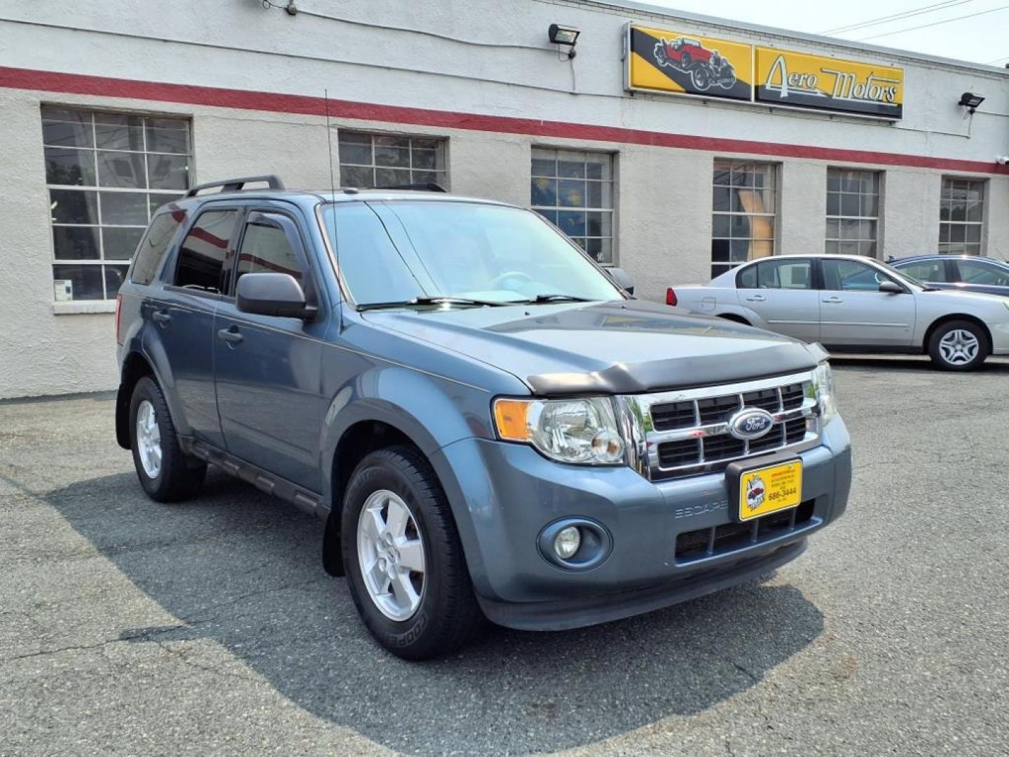 2012 Steel Blue Metallic Ford Escape XLT (1FMCU9DGXCK) with an 3.0L 3.0L Flex Fuel V6 240hp 223ft. lbs. Sequential-Port F.I. engine, 6-Speed Automatic transmission, located at 50 Eastern Blvd., Essex, MD, 21221, (410) 686-3444, 39.304367, -76.484947 - Photo#7