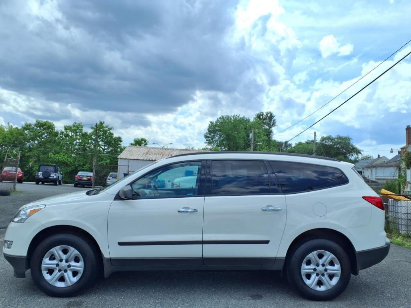 2012 White Chevrolet Traverse LS (1GNKVFED0CJ) with an 3.6L 3.6L V6 281hp 266ft. lbs. Fuel Injected engine, 6-Speed Shiftable Automatic transmission, located at 50 Eastern Blvd., Essex, MD, 21221, (410) 686-3444, 39.304367, -76.484947 - Photo#1