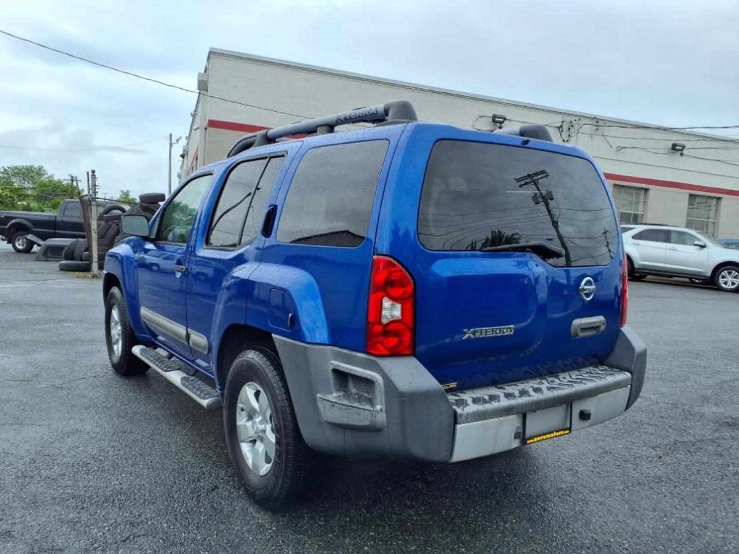 2012 Metallic Blue Nissan Xterra S (5N1AN0NU7CN) with an 4.0L 4.0L V6 261hp 281ft. lbs. Fuel Injected engine, 5-Speed Automatic transmission, located at 50 Eastern Blvd., Essex, MD, 21221, (410) 686-3444, 39.304367, -76.484947 - Photo#2