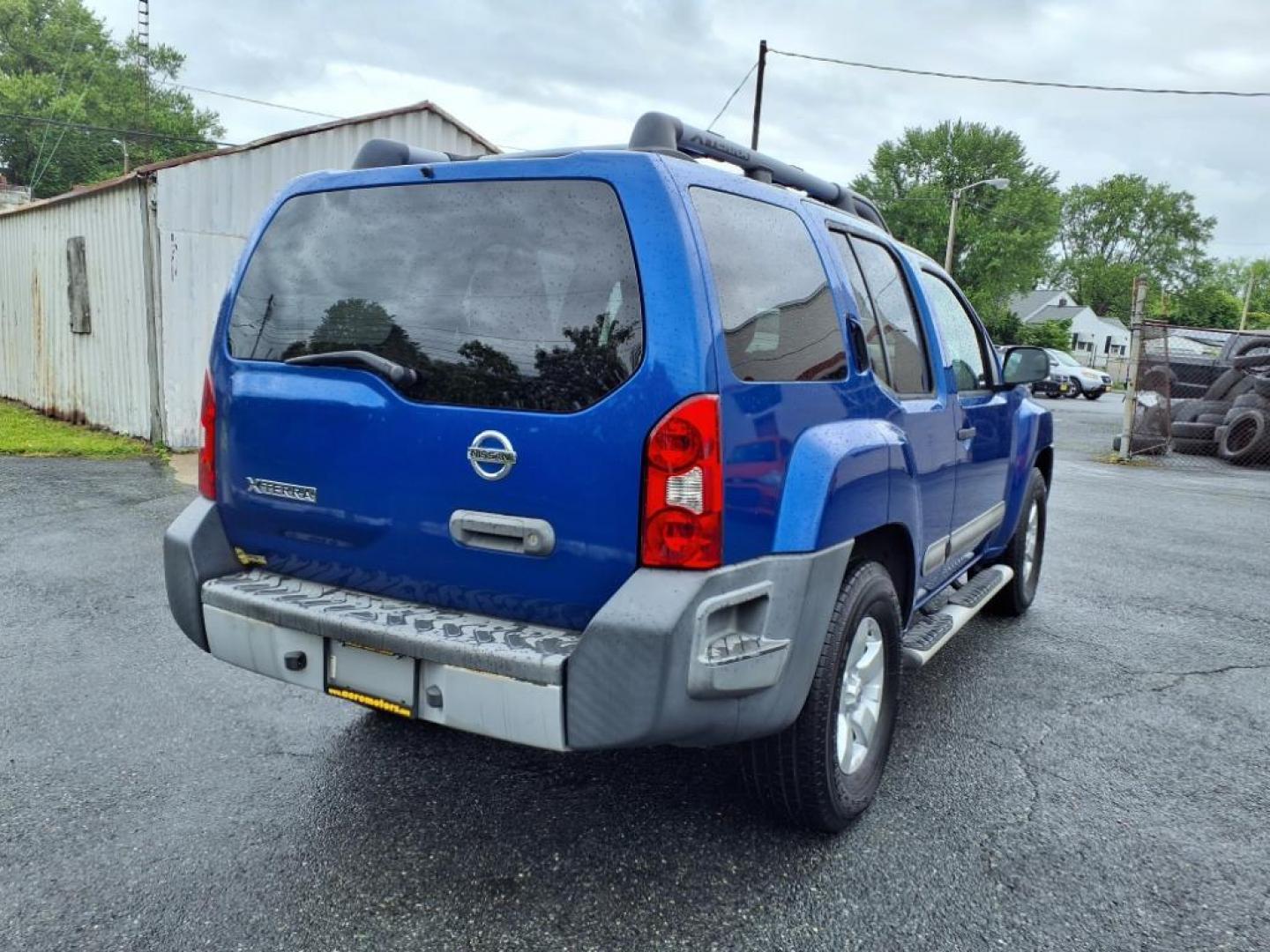2012 Metallic Blue Nissan Xterra S (5N1AN0NU7CN) with an 4.0L 4.0L V6 261hp 281ft. lbs. Fuel Injected engine, 5-Speed Automatic transmission, located at 50 Eastern Blvd., Essex, MD, 21221, (410) 686-3444, 39.304367, -76.484947 - Photo#5
