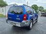 2012 Metallic Blue Nissan Xterra S (5N1AN0NU7CN) with an 4.0L 4.0L V6 261hp 281ft. lbs. Fuel Injected engine, 5-Speed Automatic transmission, located at 50 Eastern Blvd., Essex, MD, 21221, (410) 686-3444, 39.304367, -76.484947 - Photo#5