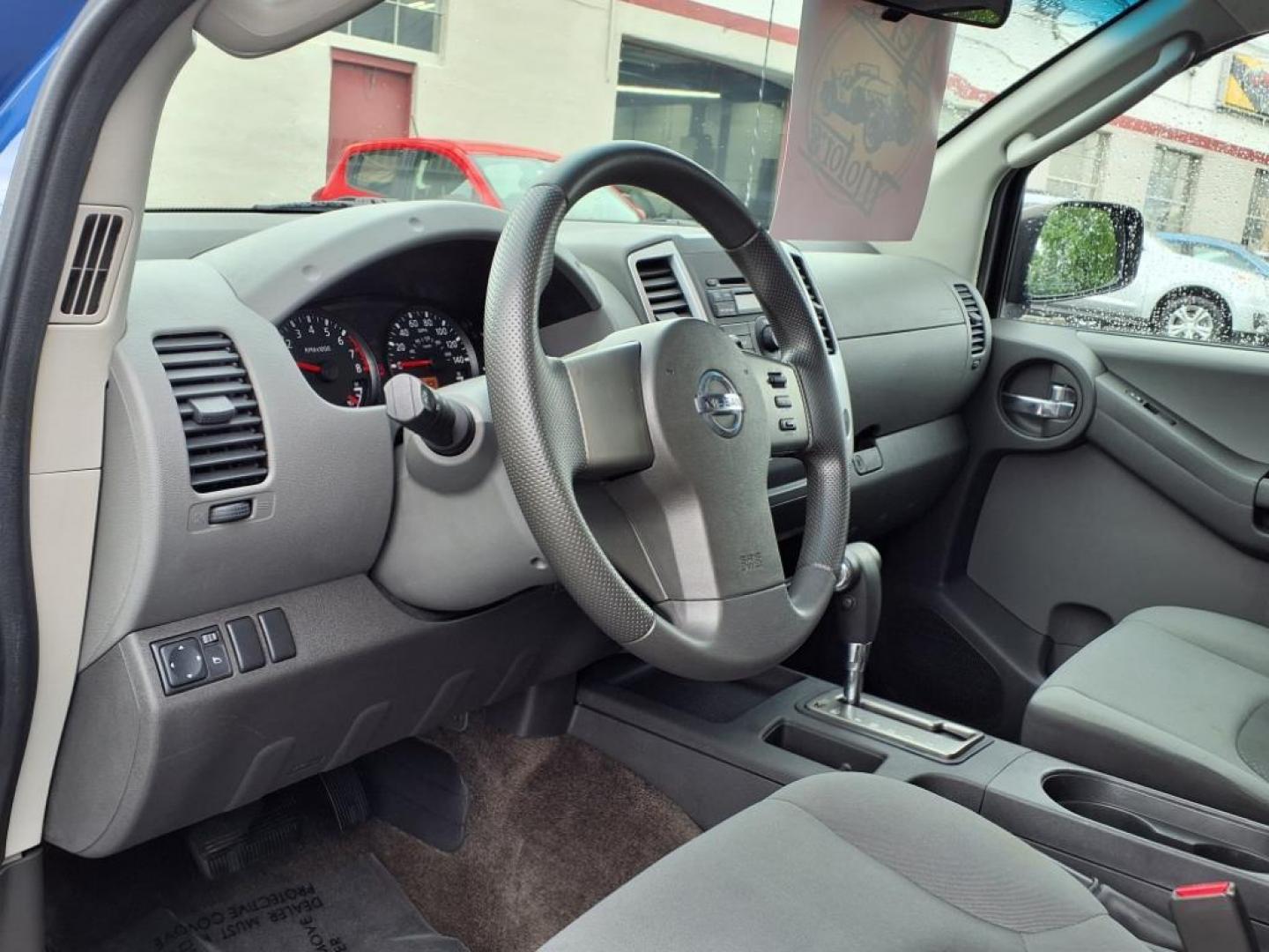2012 Metallic Blue Nissan Xterra S (5N1AN0NU7CN) with an 4.0L 4.0L V6 261hp 281ft. lbs. Fuel Injected engine, 5-Speed Automatic transmission, located at 50 Eastern Blvd., Essex, MD, 21221, (410) 686-3444, 39.304367, -76.484947 - Photo#11