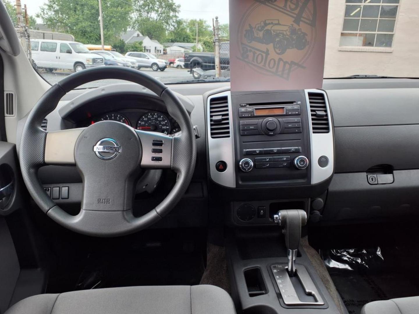 2012 Metallic Blue Nissan Xterra S (5N1AN0NU7CN) with an 4.0L 4.0L V6 261hp 281ft. lbs. Fuel Injected engine, 5-Speed Automatic transmission, located at 50 Eastern Blvd., Essex, MD, 21221, (410) 686-3444, 39.304367, -76.484947 - Photo#15