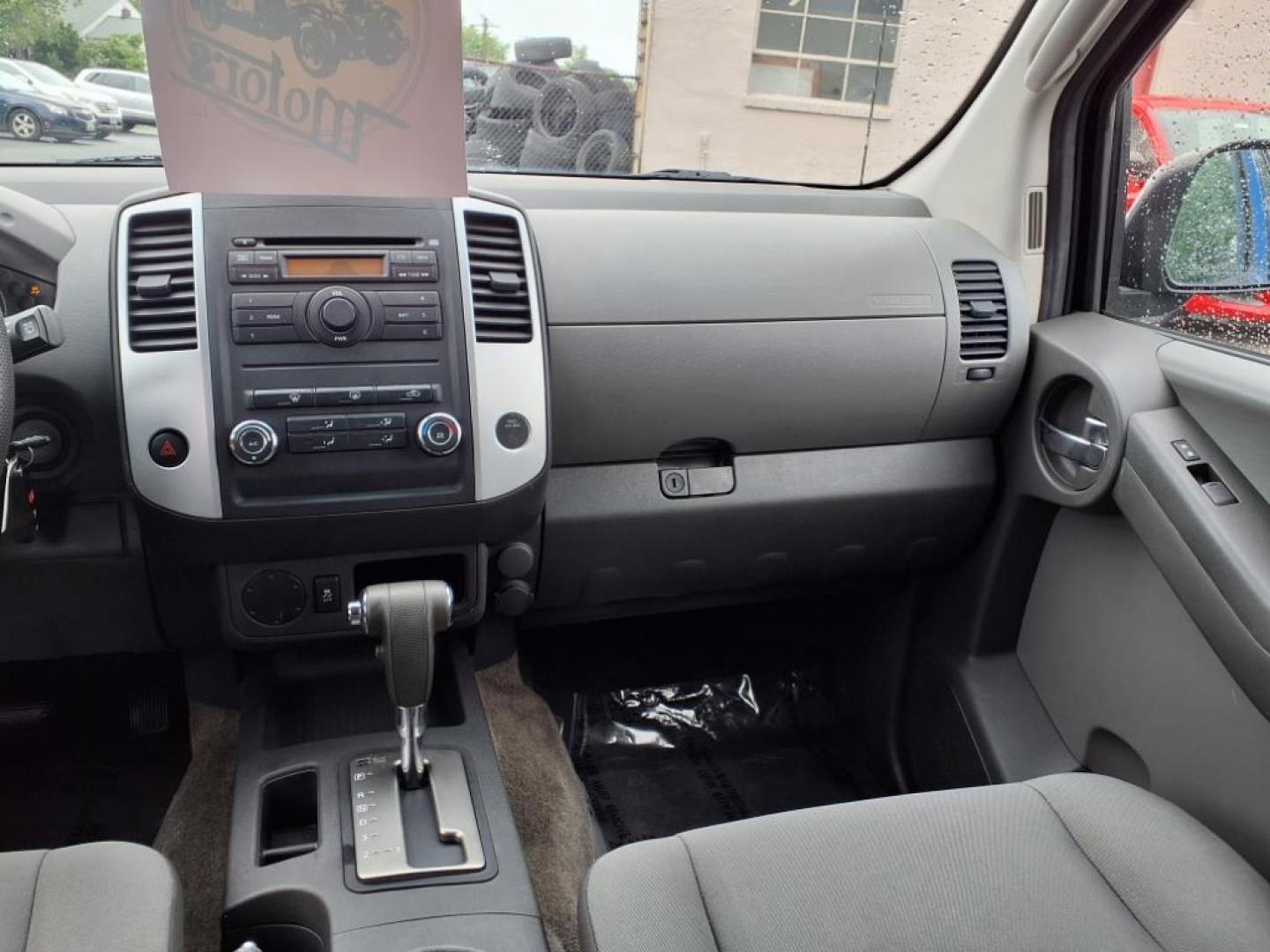 2012 Metallic Blue Nissan Xterra S (5N1AN0NU7CN) with an 4.0L 4.0L V6 261hp 281ft. lbs. Fuel Injected engine, 5-Speed Automatic transmission, located at 50 Eastern Blvd., Essex, MD, 21221, (410) 686-3444, 39.304367, -76.484947 - Photo#16
