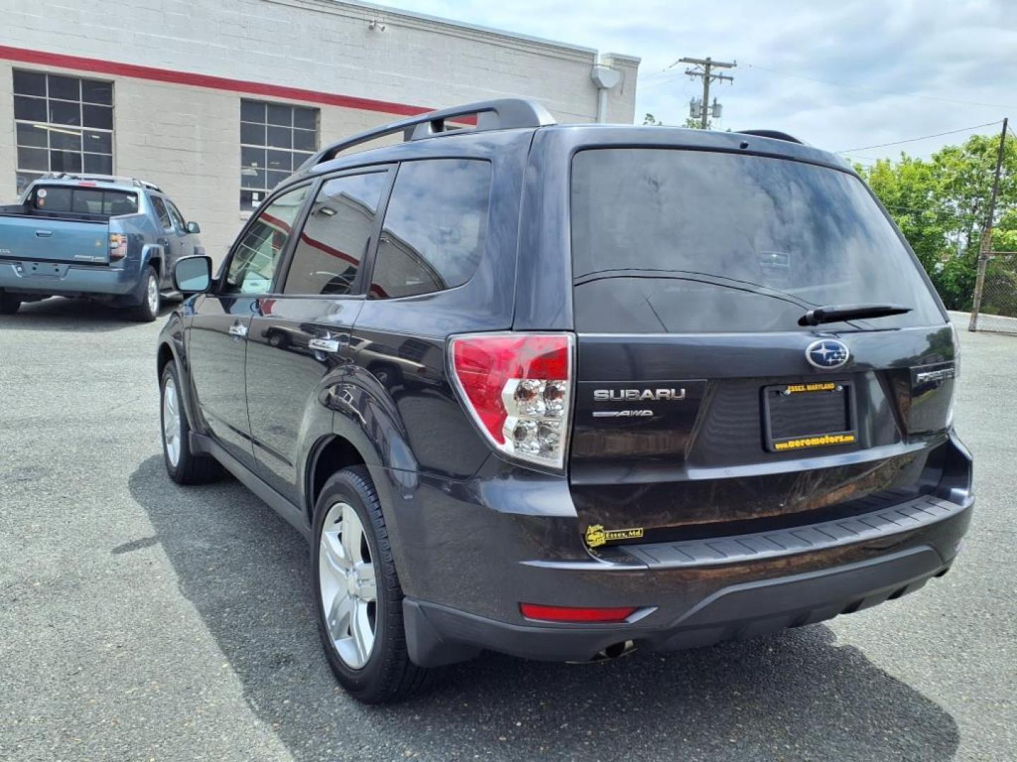 2010 Dk. Blue Subaru Forester 2.0XT Premium (JF2SH6CCXAH) with an 2.5L 4 Cylinder Sequential-Port F.I. engine, Automatic transmission, located at 50 Eastern Blvd., Essex, MD, 21221, (410) 686-3444, 39.304367, -76.484947 - Photo#2