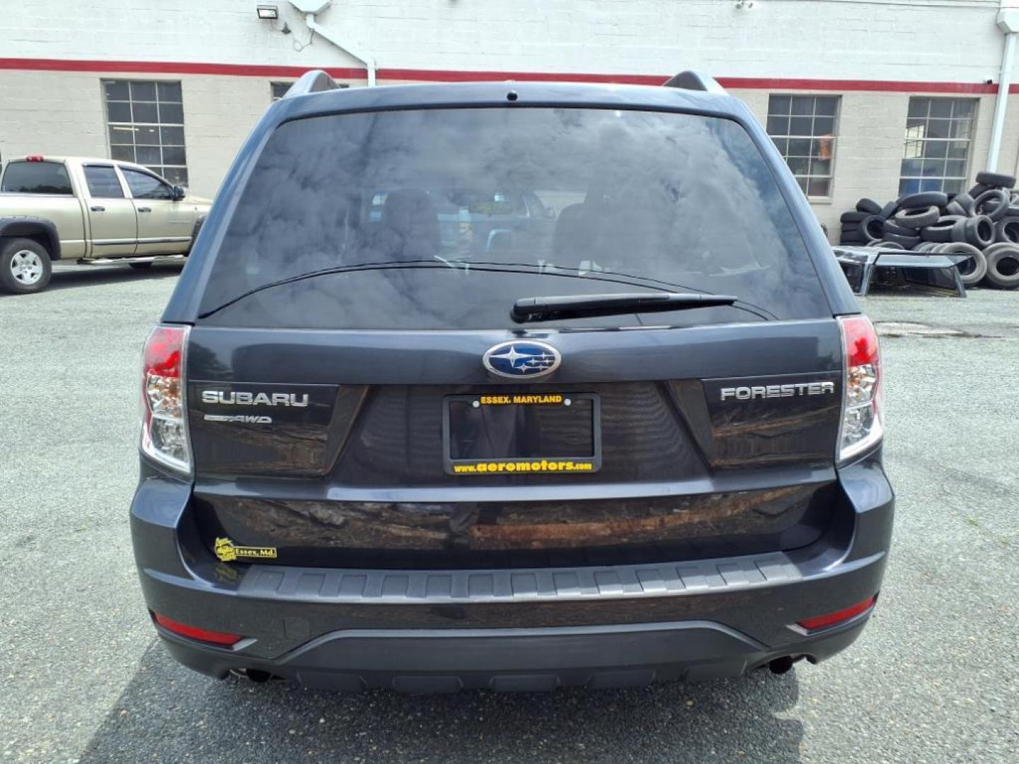 2010 Dk. Blue Subaru Forester 2.0XT Premium (JF2SH6CCXAH) with an 2.5L 4 Cylinder Sequential-Port F.I. engine, Automatic transmission, located at 50 Eastern Blvd., Essex, MD, 21221, (410) 686-3444, 39.304367, -76.484947 - Photo#3
