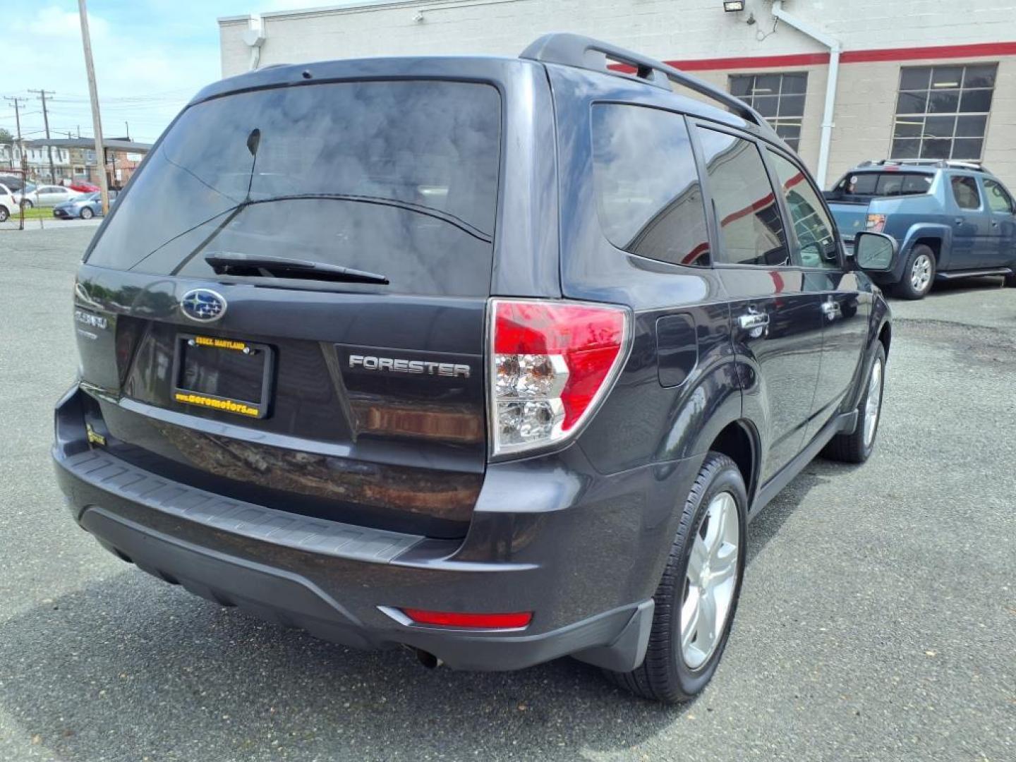 2010 Dk. Blue Subaru Forester 2.0XT Premium (JF2SH6CCXAH) with an 2.5L 4 Cylinder Sequential-Port F.I. engine, Automatic transmission, located at 50 Eastern Blvd., Essex, MD, 21221, (410) 686-3444, 39.304367, -76.484947 - Photo#5
